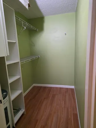 a bathroom with a sink a mirror and vanity