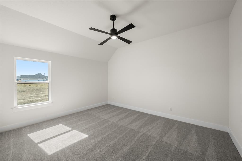 4867 Prairie Sky Lane DISH, TX 76247 - Photo 15 of 27 an empty room with a window and a ceiling fan