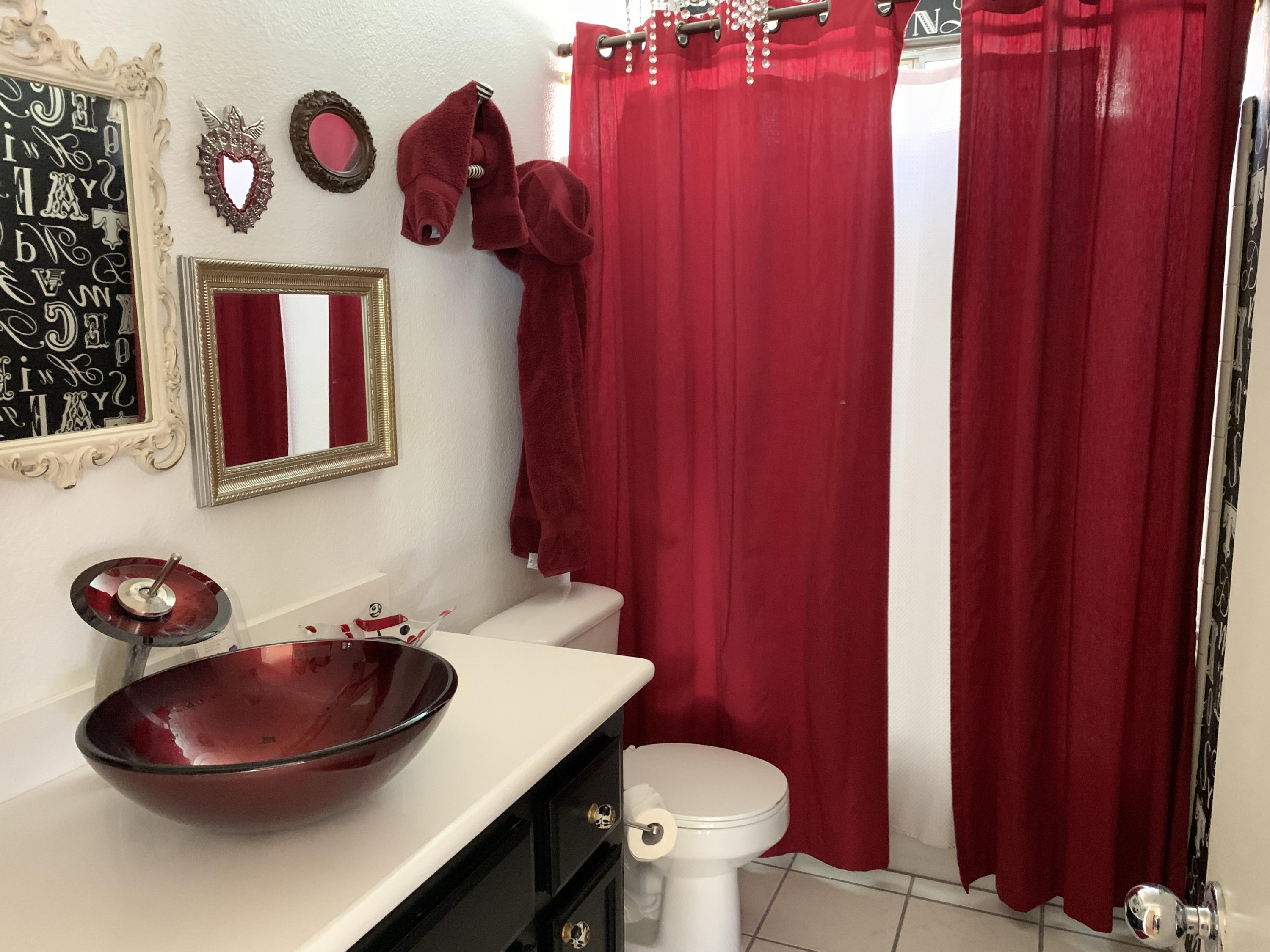 67725 Garbino Road Cathedral City, CA 92234 - Photo 5 of 16 a bathroom with a sink toilet and a mirror