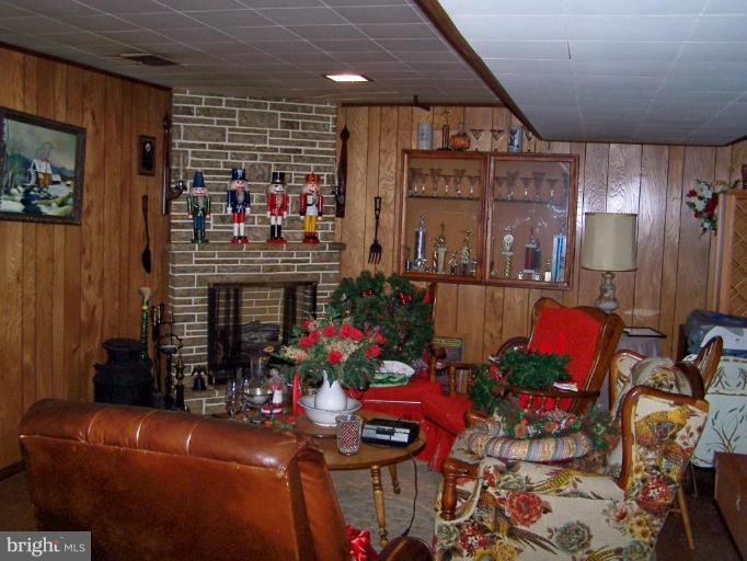 9133 Covered Bridge Road Parkville, MD 21234 - Photo 14 of 16 Rec Room - Sitting Area and Fireplace