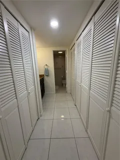 a bathroom with a toilet and shower