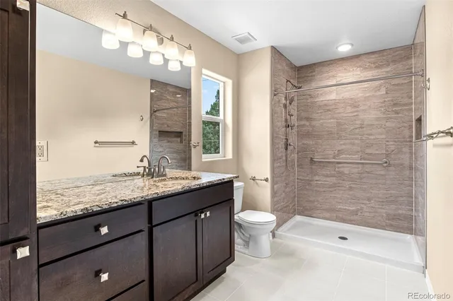 a view of a balcony with table and chairs