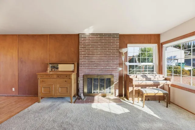 a view of a livingroom with a fireplace