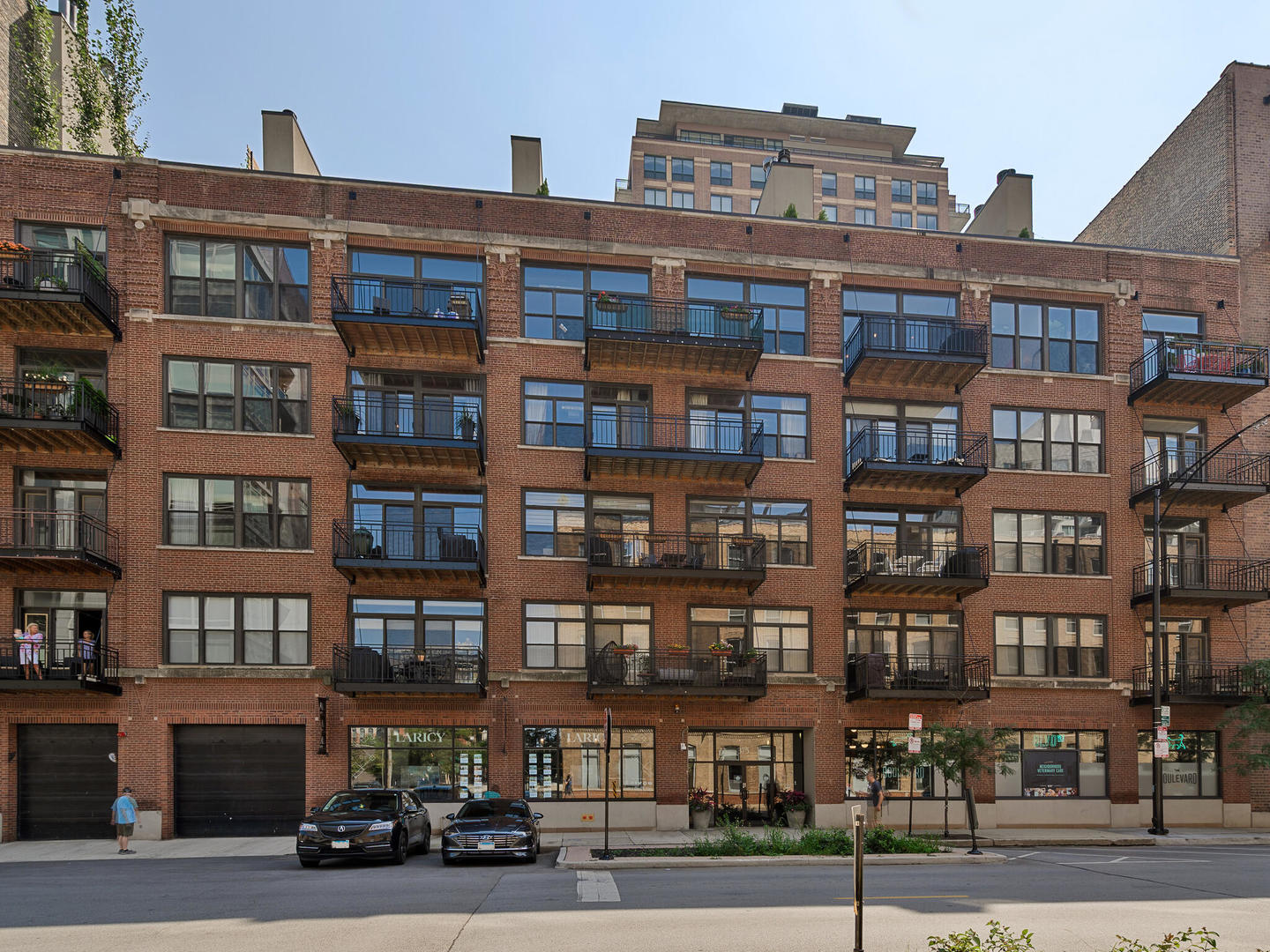 375 West Erie Street, Unit 508 Chicago, IL 60654 - Photo 2 of 16 a view of a large building and a street