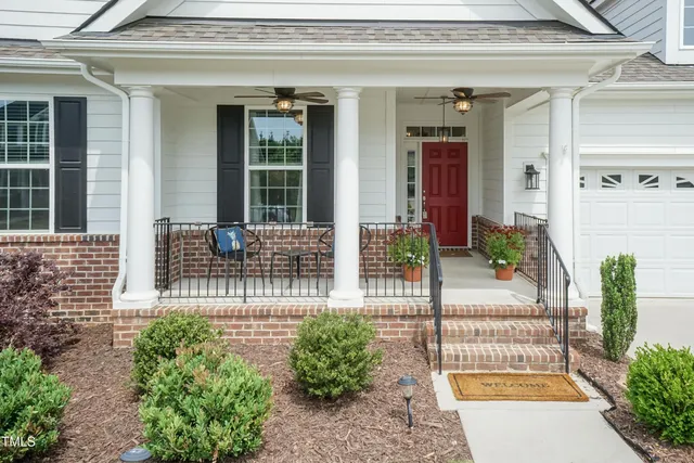 a view of a house with a outdoor seating