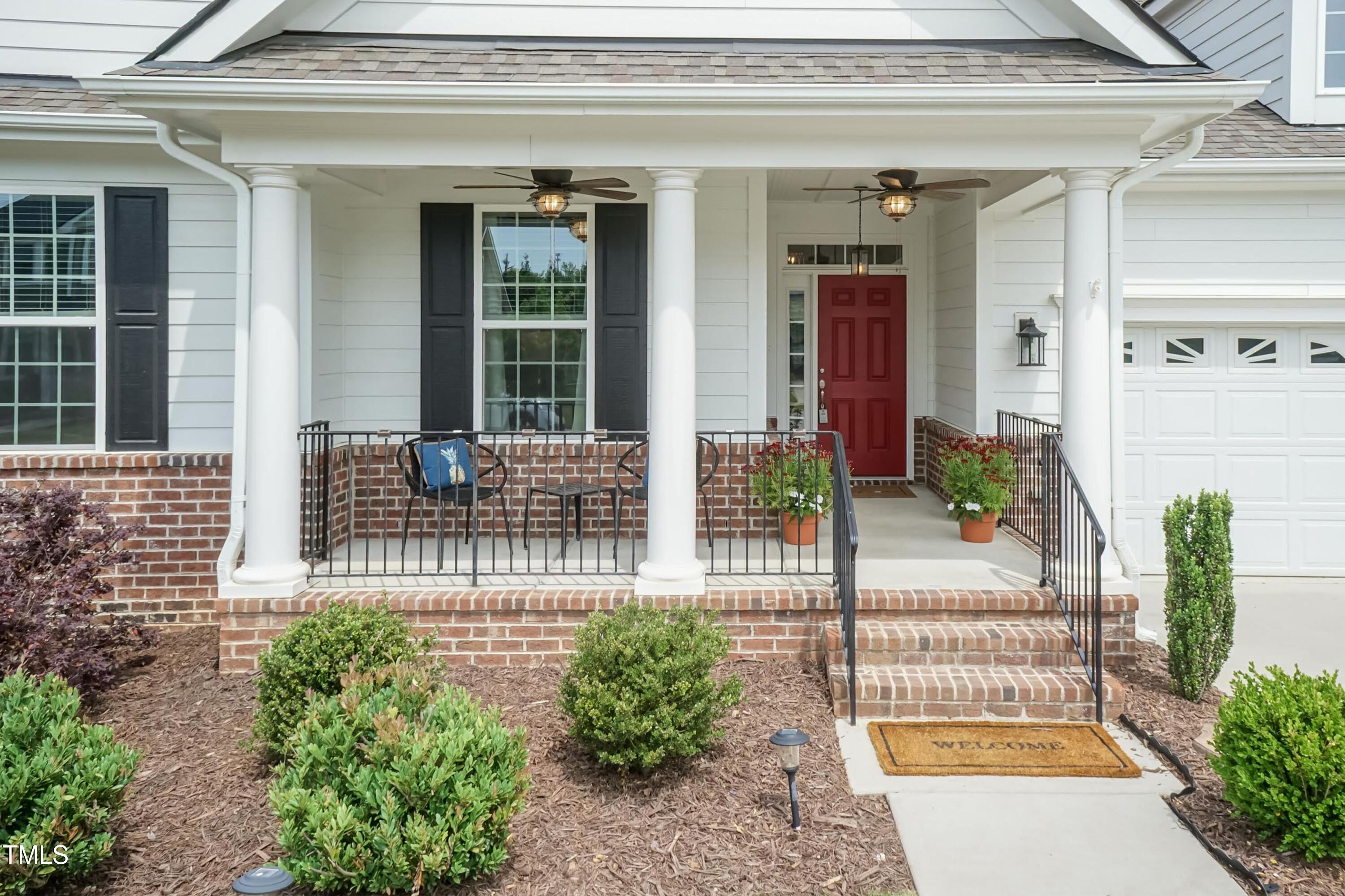a view of a house with a outdoor seating