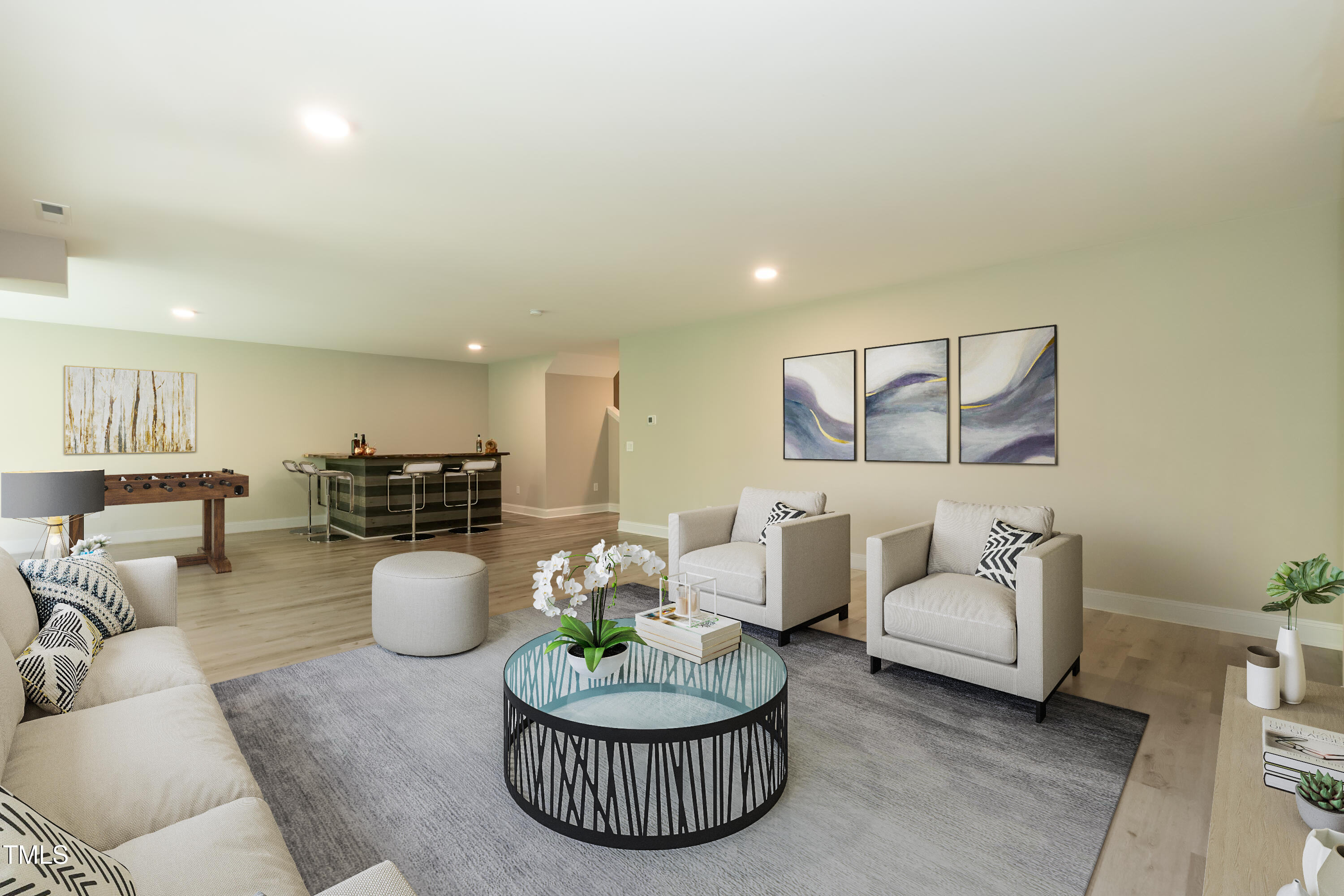 273 Scarlet Tanager Circle Holly Springs, NC 27540 - Photo 26 of 35 a living room with furniture and a wooden floor