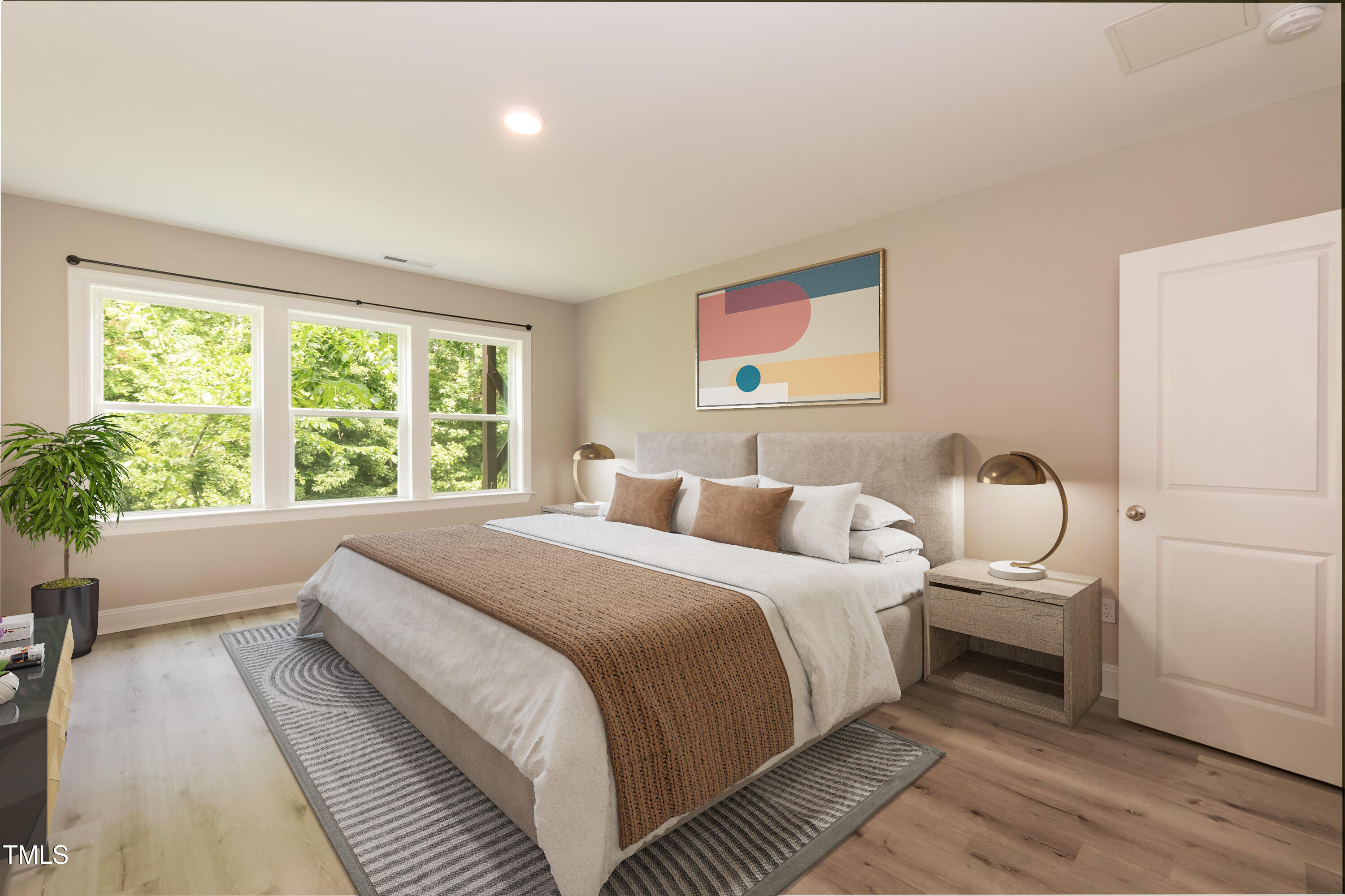 273 Scarlet Tanager Circle Holly Springs, NC 27540 - Photo 28 of 35 a bedroom with bed and a large window