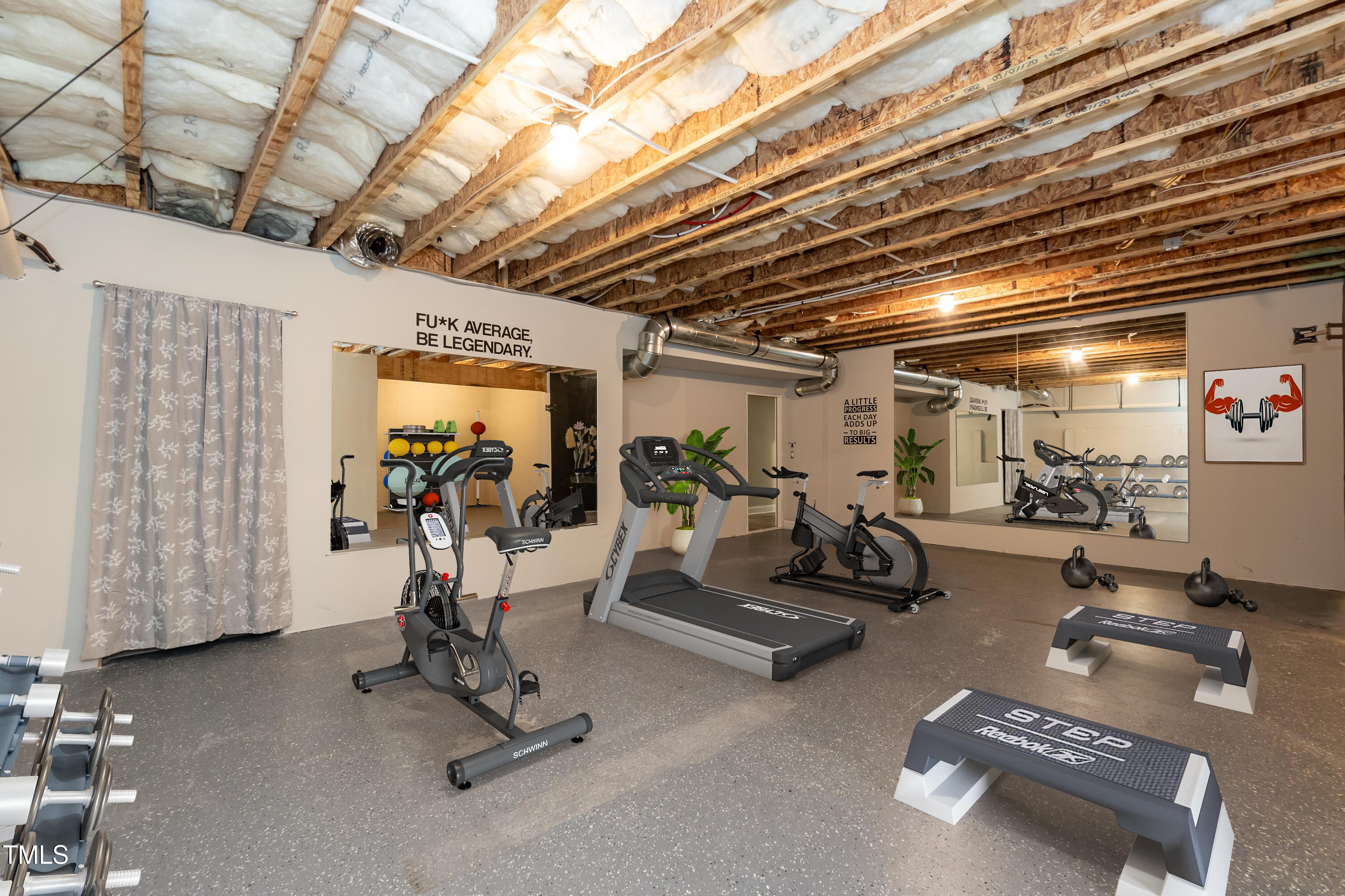 273 Scarlet Tanager Circle Holly Springs, NC 27540 - Photo 29 of 35 a view of a room with gym equipment