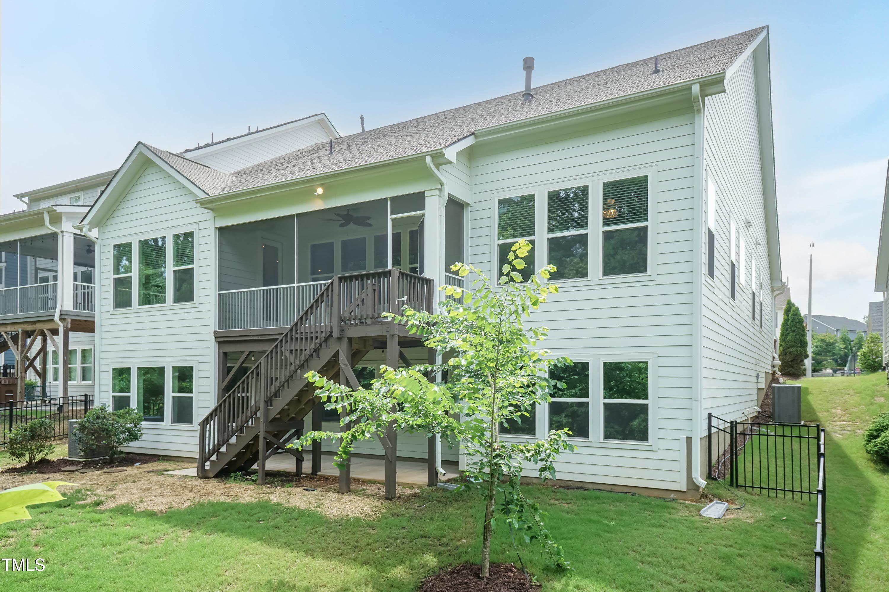 273 Scarlet Tanager Circle Holly Springs, NC 27540 - Photo 33 of 35 front view of a house with a yard