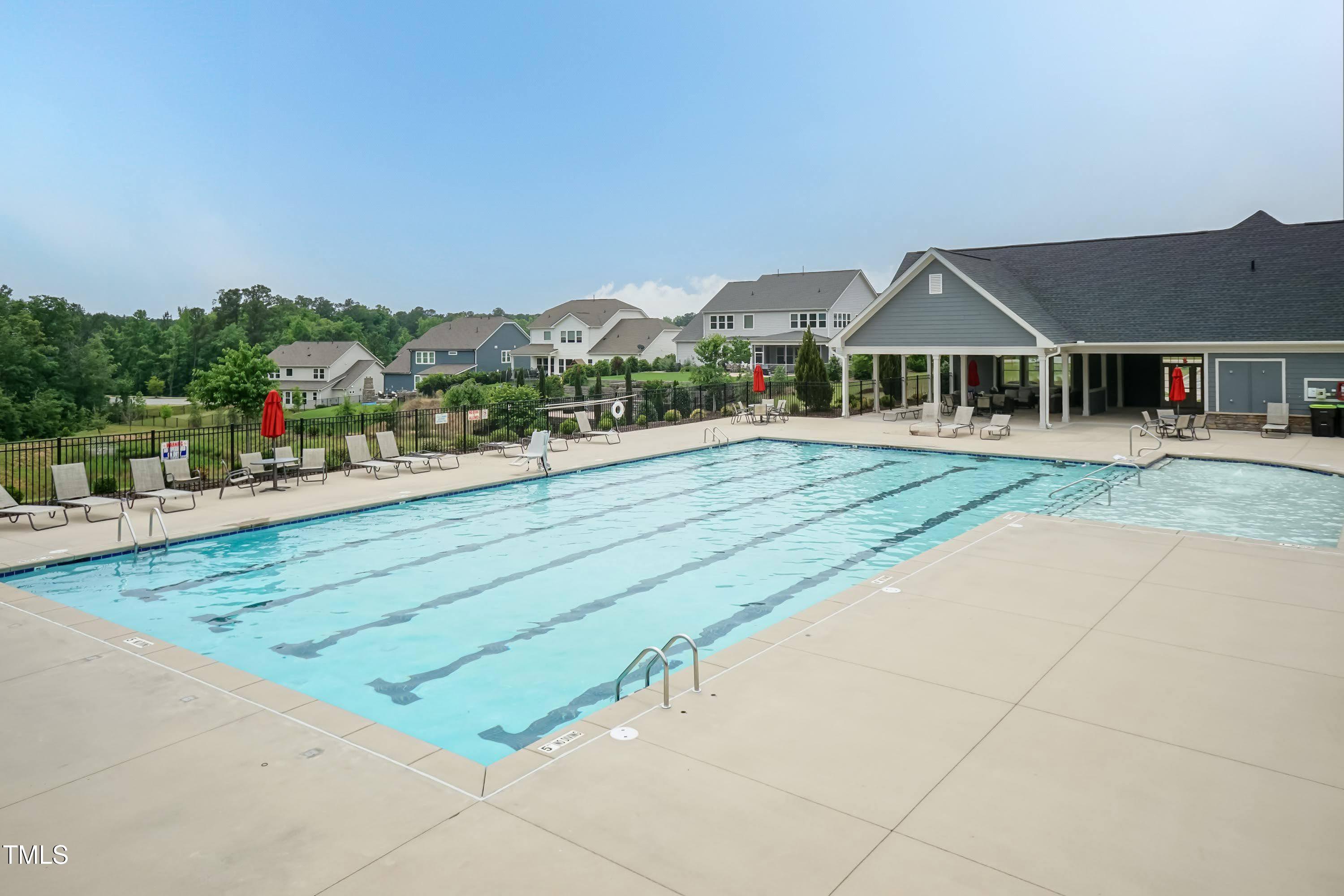 273 Scarlet Tanager Circle Holly Springs, NC 27540 - Photo 35 of 35 a view of a house with a yard