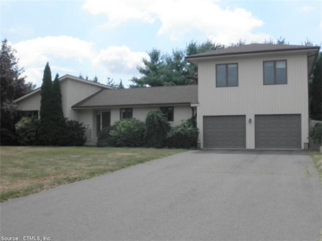 3 Paper Chase South Windsor, CT 06074 - Photo 1 of 1 a front view of a house with garage