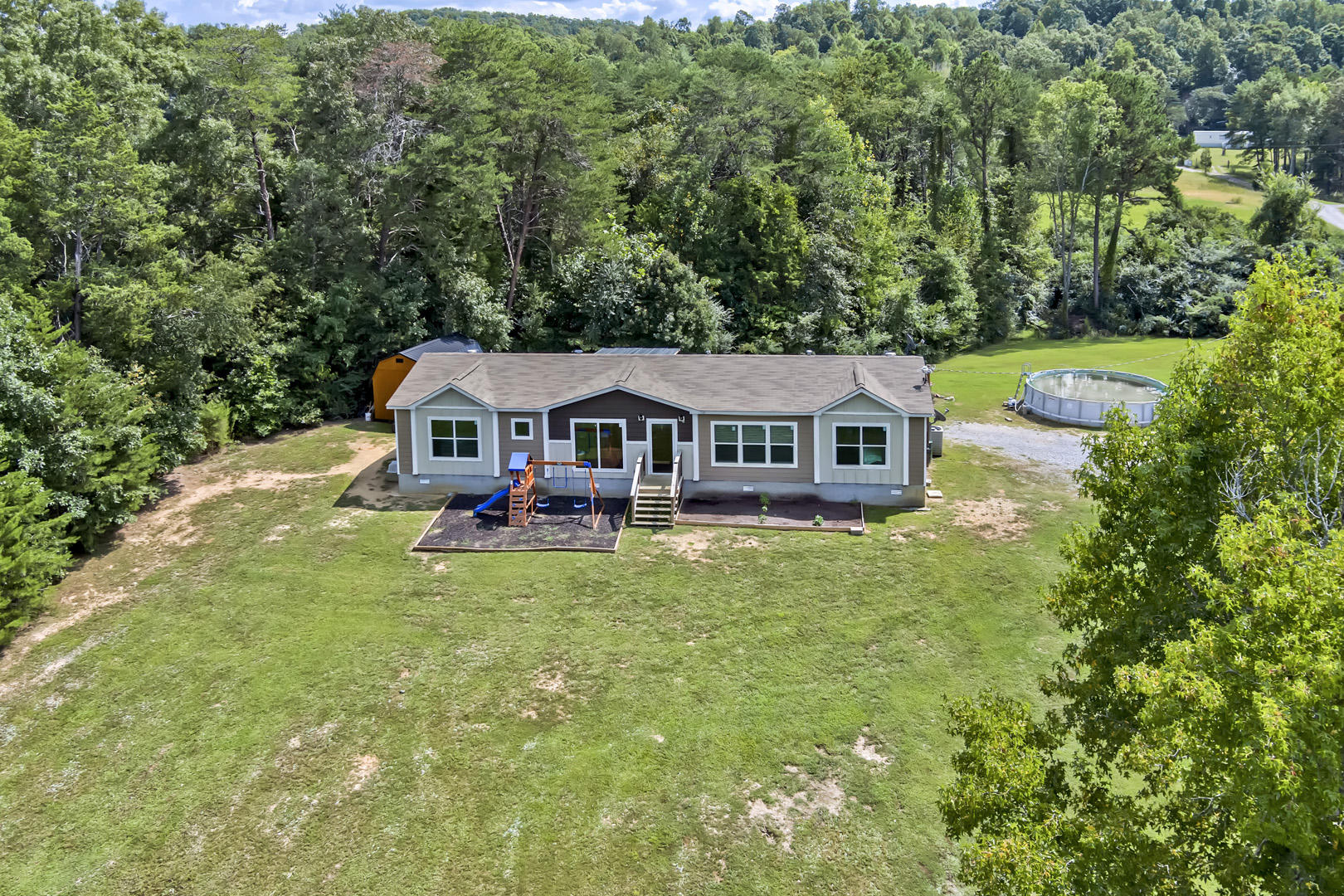 325 Henry Bidwell Road Decatur, TN 37322 - Photo 2 of 36 02_HenryBidwellLane_325_FrontBirdseye