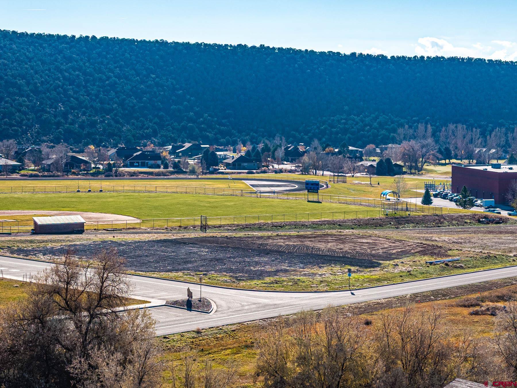 520 Southeast Stonebridge Drive Cedaredge, CO 81413 - Photo 11 of 15 a view of an swimming pool and an outdoor space