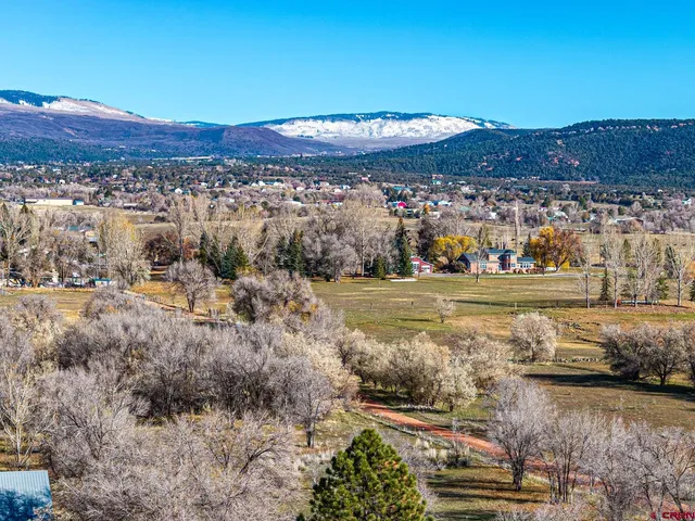 a view of mountain with sunset