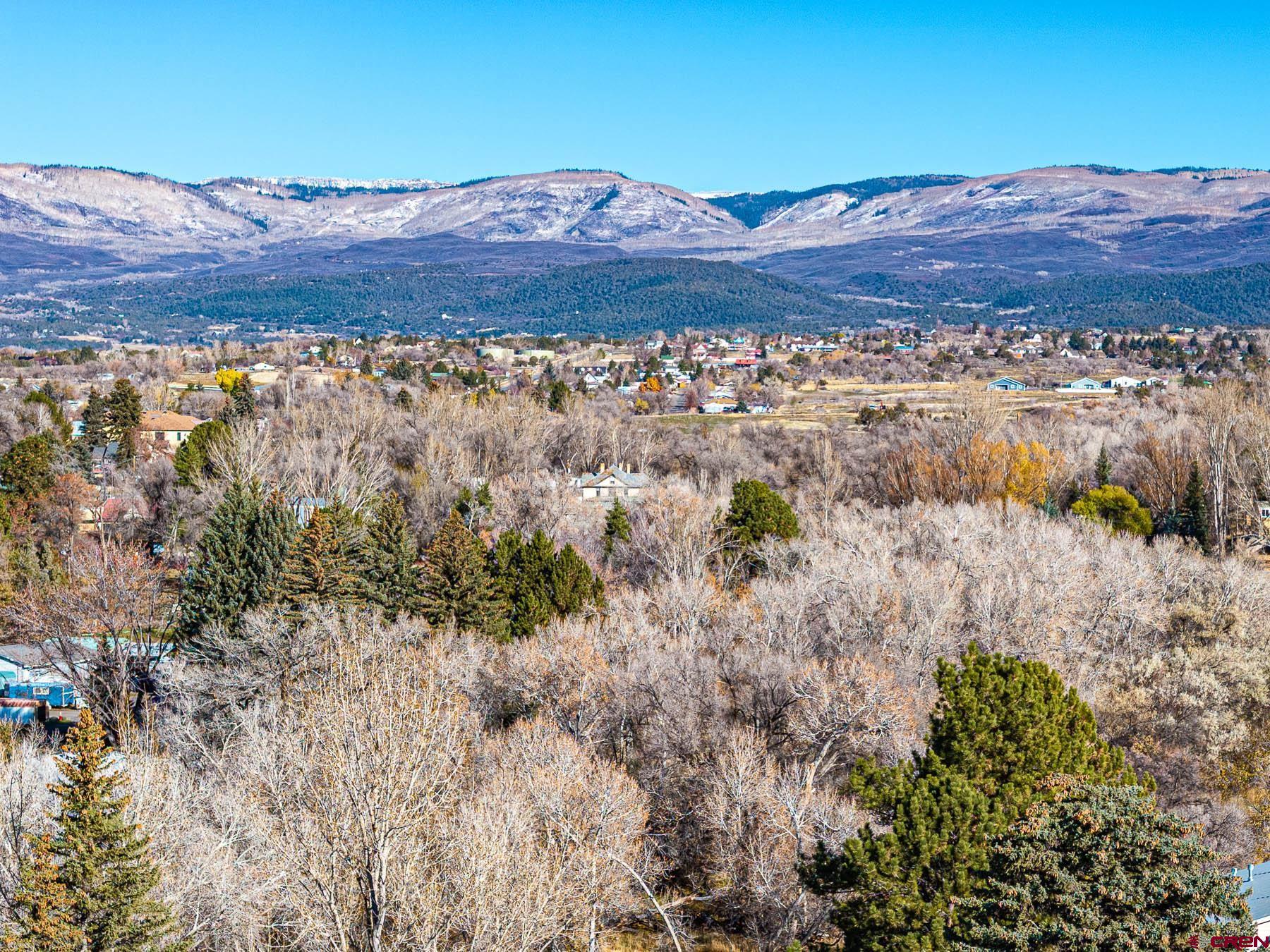 520 Southeast Stonebridge Drive Cedaredge, CO 81413 - Photo 13 of 15 a view of mountain with sunset