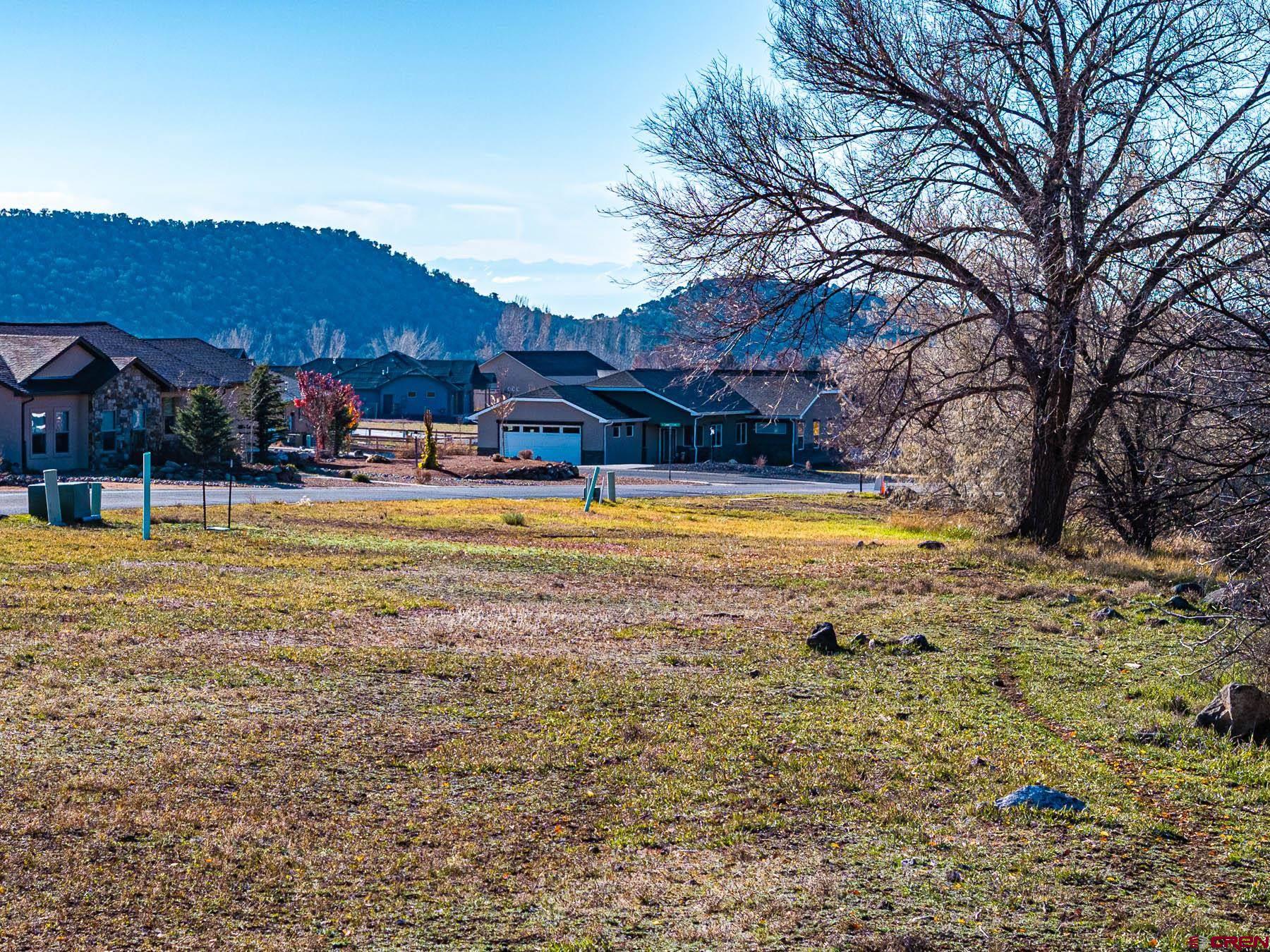 520 Southeast Stonebridge Drive Cedaredge, CO 81413 - Photo 4 of 15 a view of a swimming pool with an outdoor seating