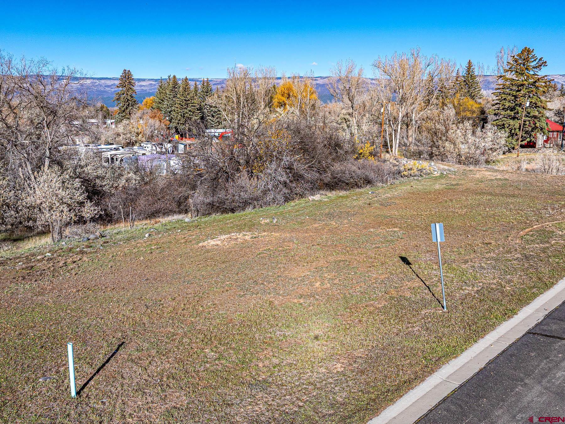 520 Southeast Stonebridge Drive Cedaredge, CO 81413 - Photo 5 of 15 a view of a field of mountains and lake view