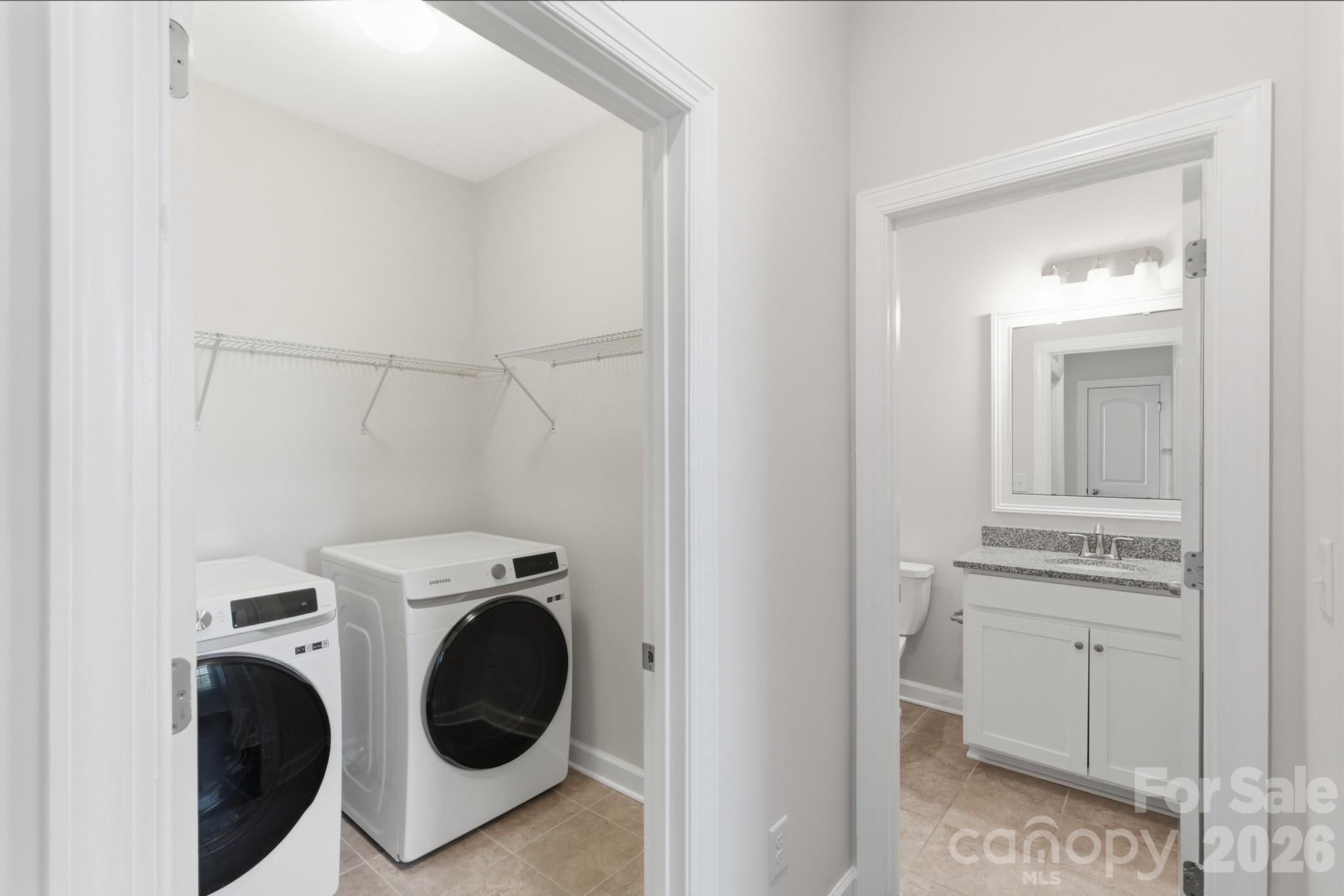 11515 Red Rust Lane Charlotte, NC 28277 - Photo 36 of 48 a utility room with dryer and washer