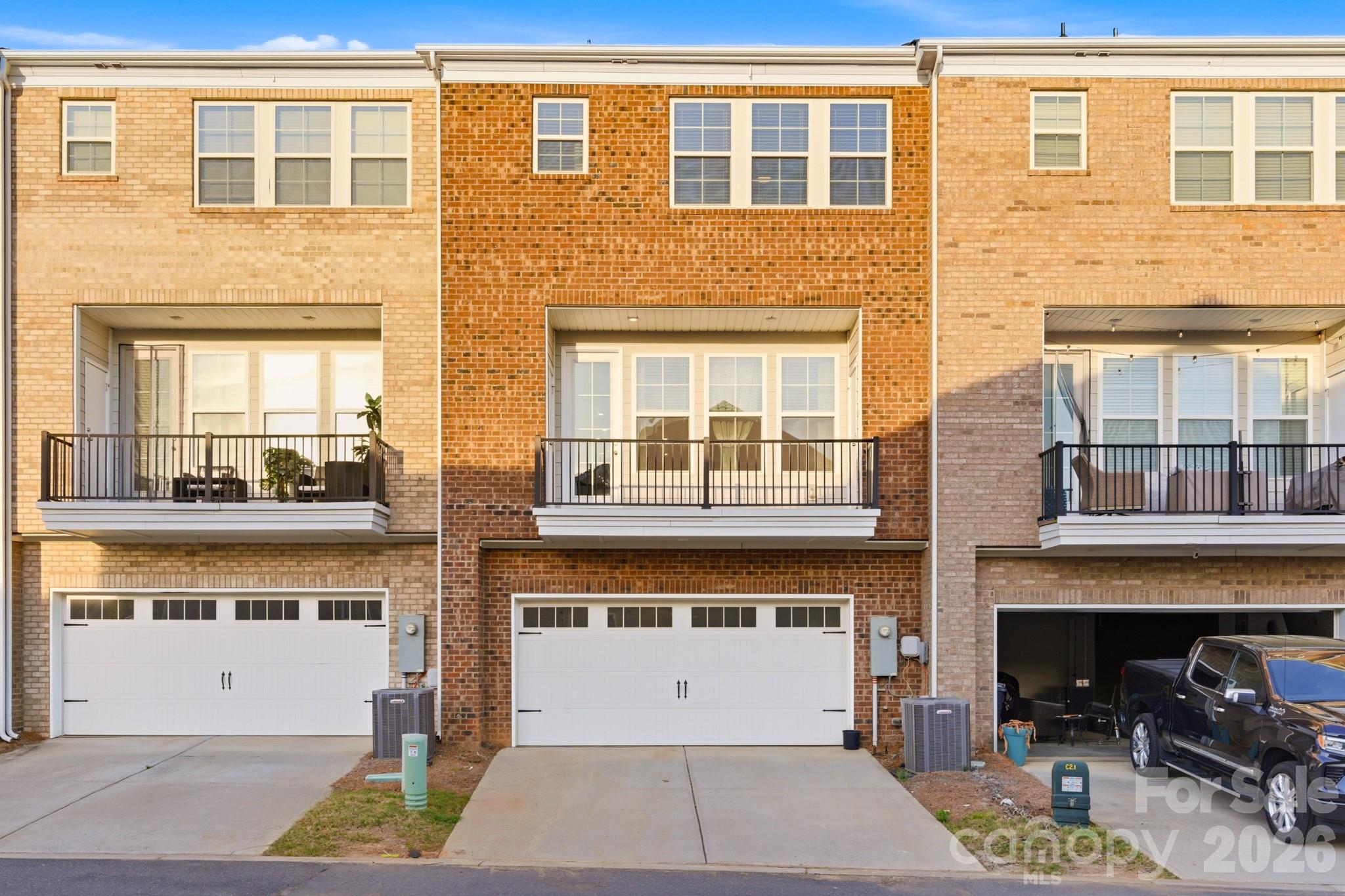11515 Red Rust Lane Charlotte, NC 28277 - Photo 44 of 48 a large building with a lot of windows
