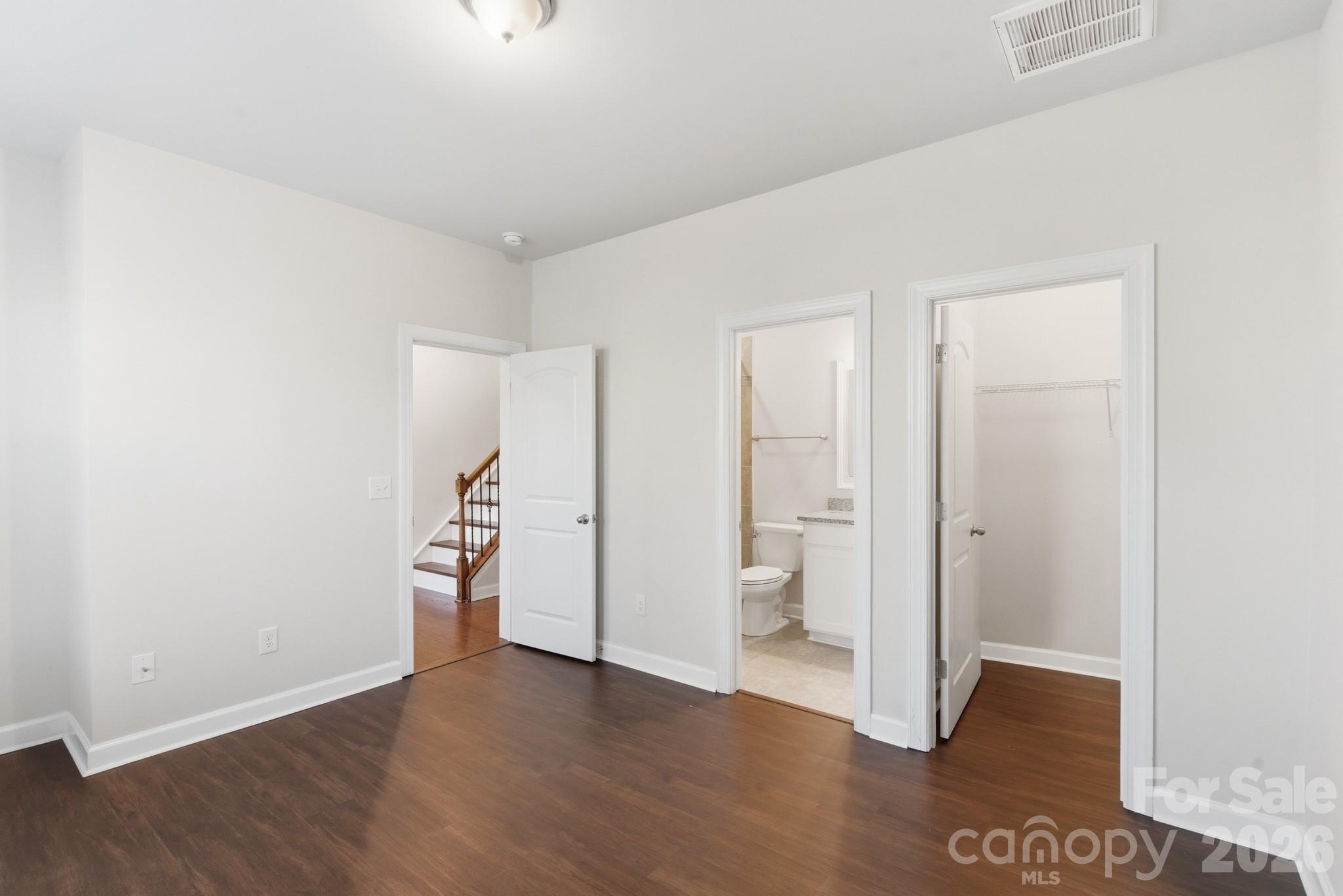 11515 Red Rust Lane Charlotte, NC 28277 - Photo 10 of 48 a view of empty room with wooden floor