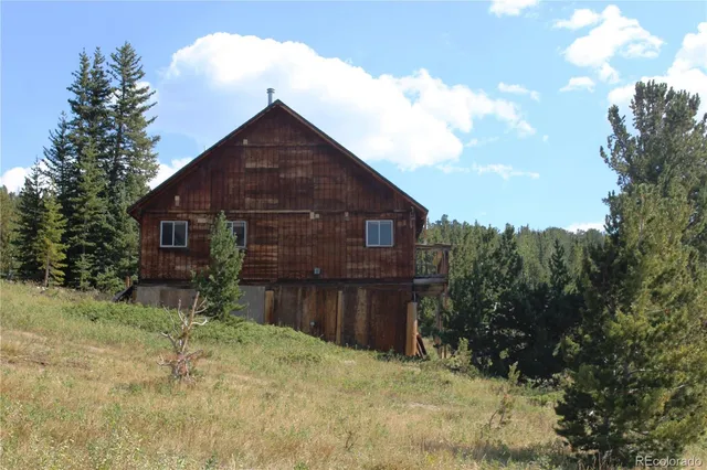a house view with a backyard space