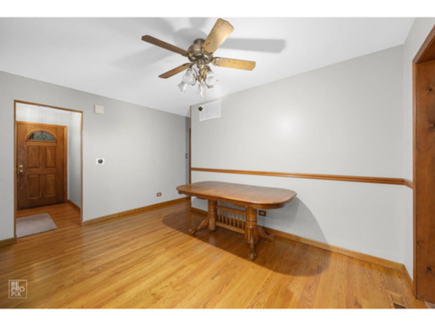 769 Penrith Avenue Elk Grove Village, IL 60007 - Photo 9 of 10 a view of an empty room and wooden floor