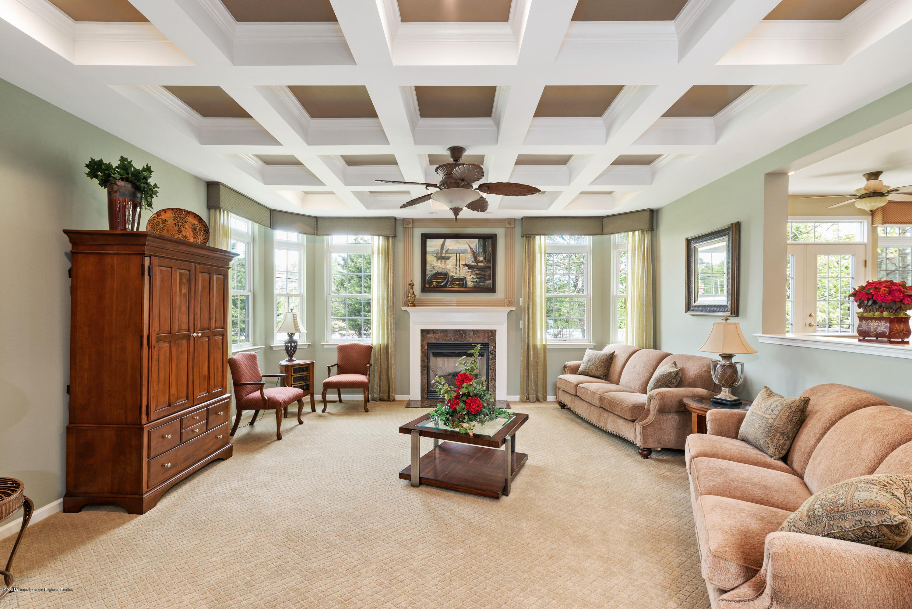 1 Bellagio Road Jackson, NJ 08527 - Photo 11 of 48 a living room with furniture fireplace and flat screen tv