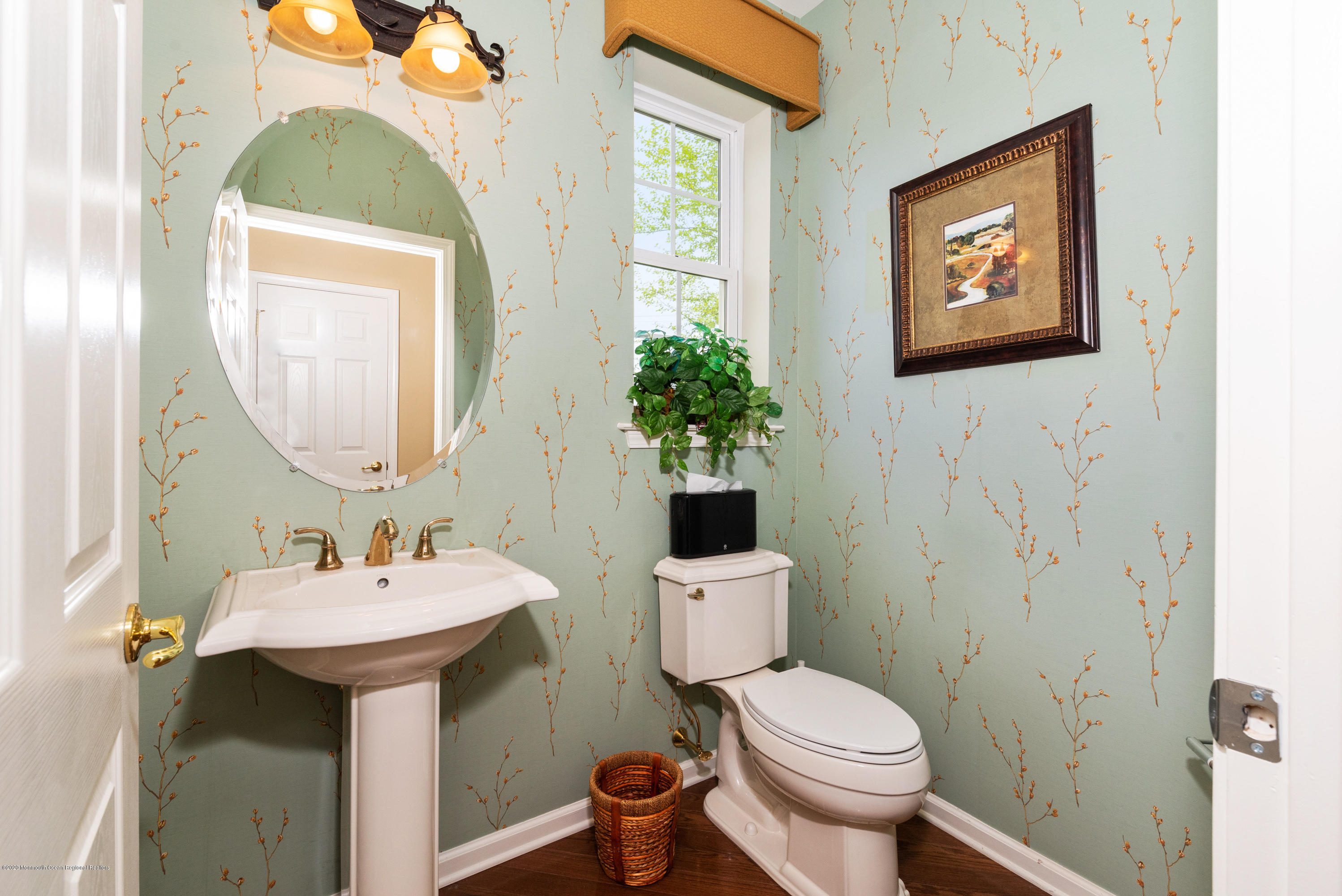 1 Bellagio Road Jackson, NJ 08527 - Photo 16 of 48 a bathroom with a toilet sink and mirror