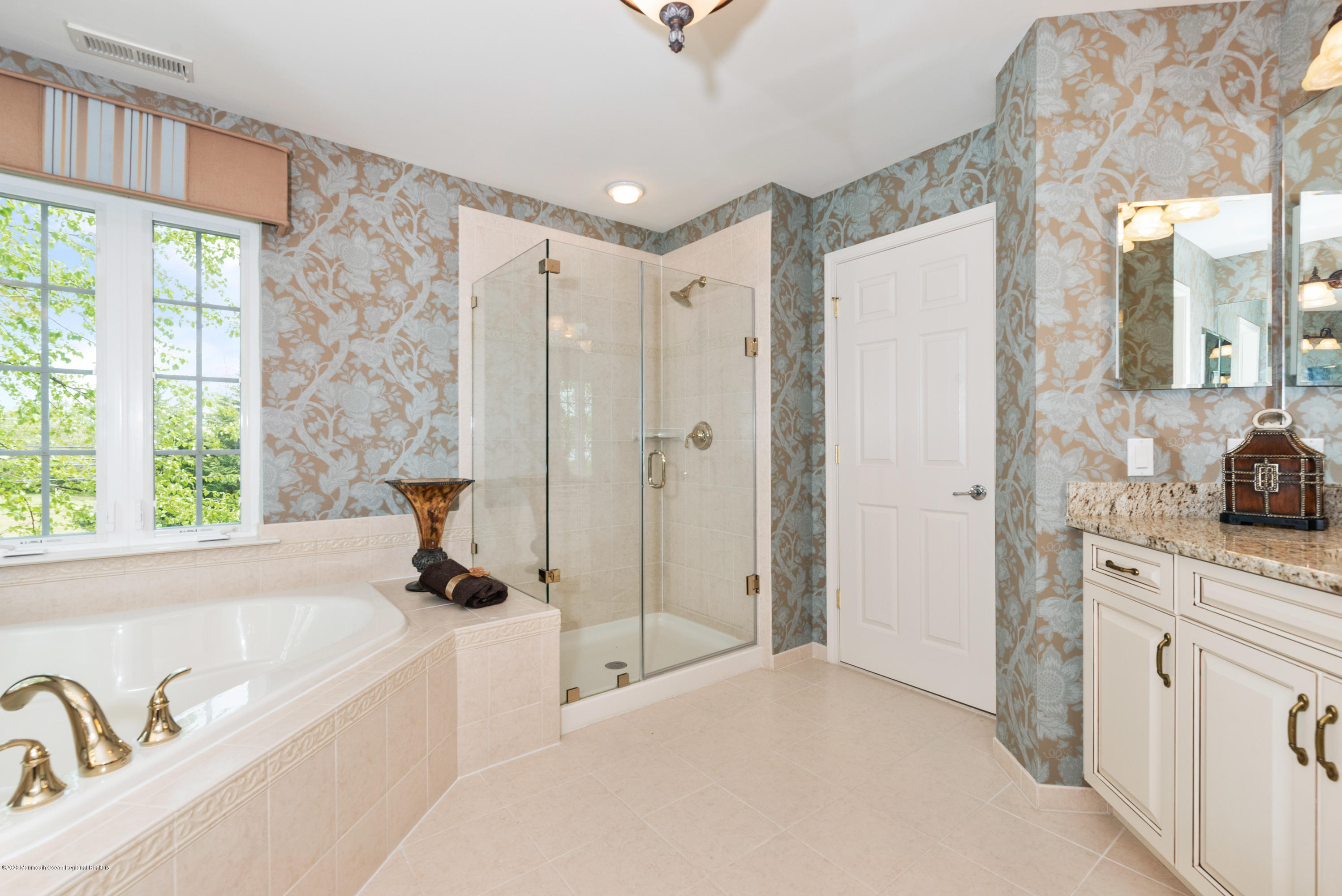 1 Bellagio Road Jackson, NJ 08527 - Photo 22 of 48 a spacious bathroom with a tub shower and a sink