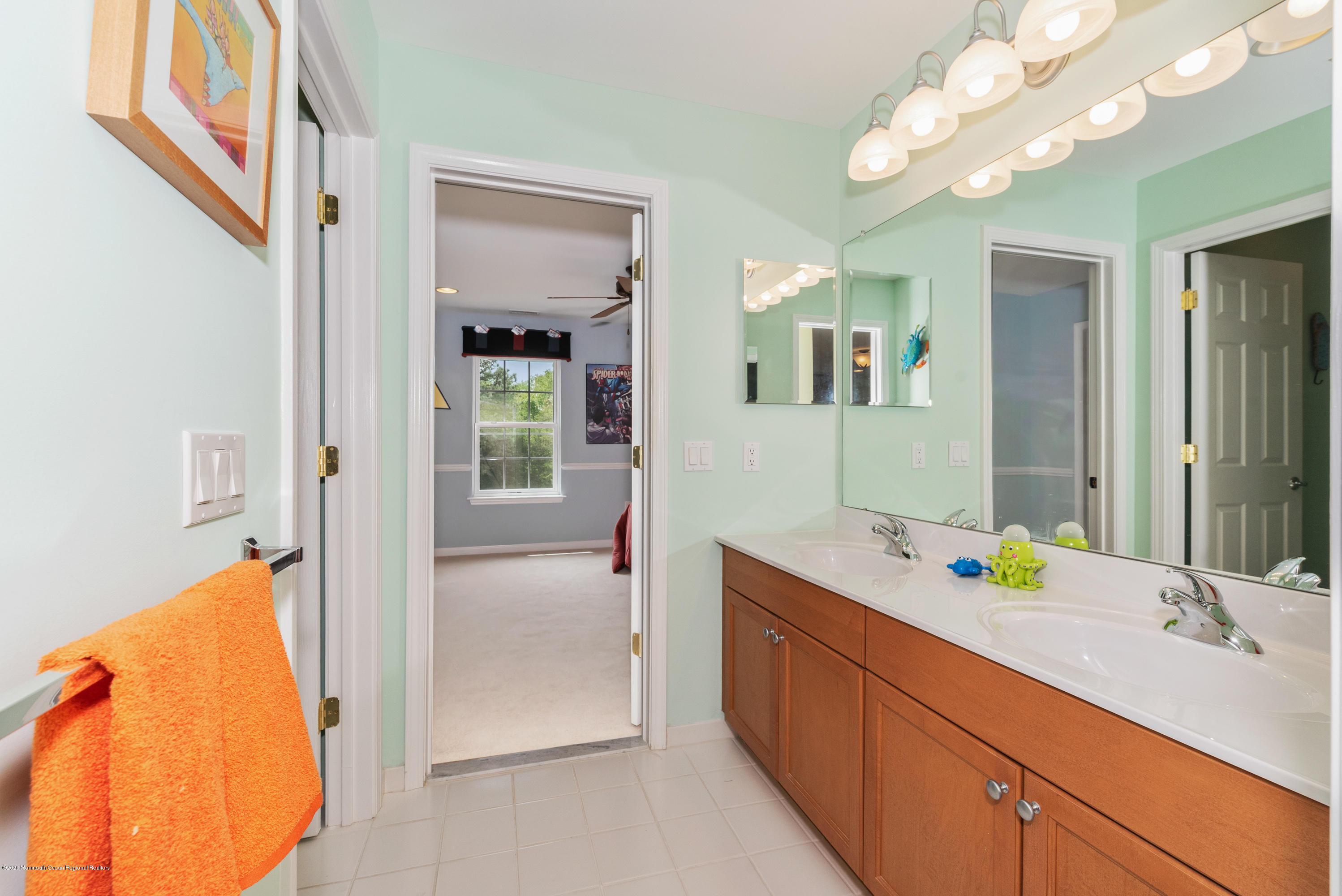 1 Bellagio Road Jackson, NJ 08527 - Photo 30 of 48 a bathroom with a sink vanity and a mirror