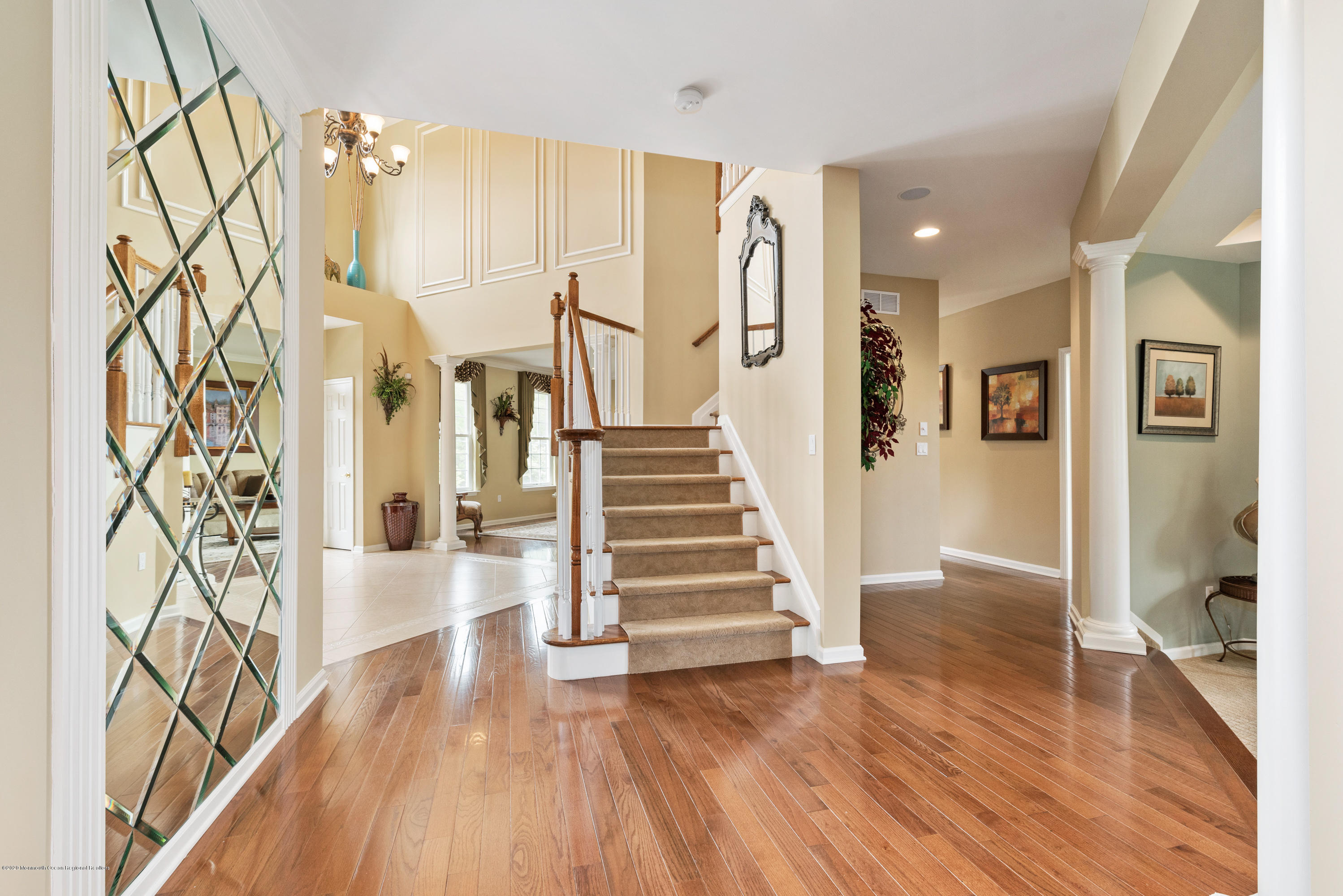 1 Bellagio Road Jackson, NJ 08527 - Photo 33 of 48 a view of entryway with wooden floor and stairs