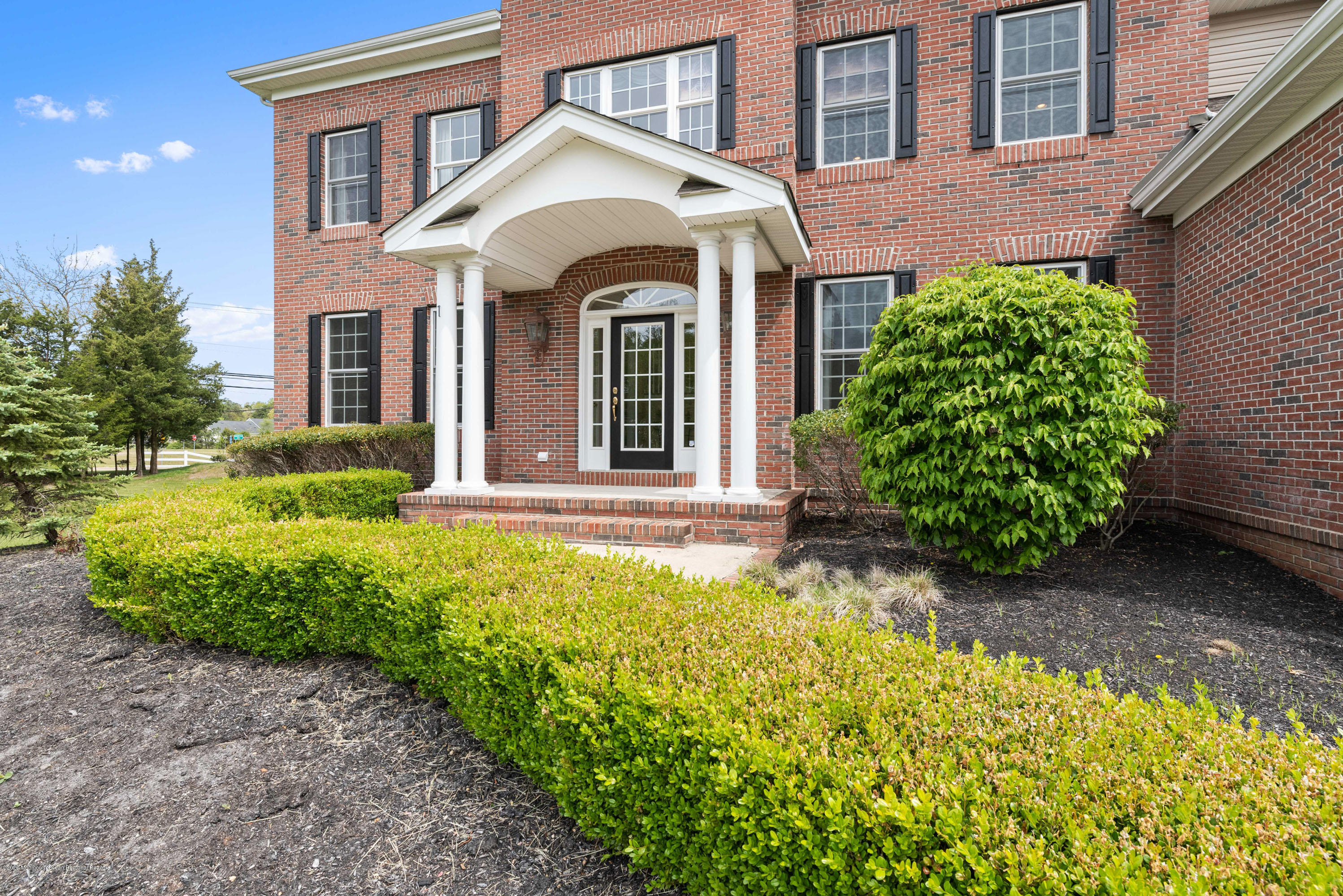 1 Bellagio Road Jackson, NJ 08527 - Photo 46 of 48 a front view of a house with garden