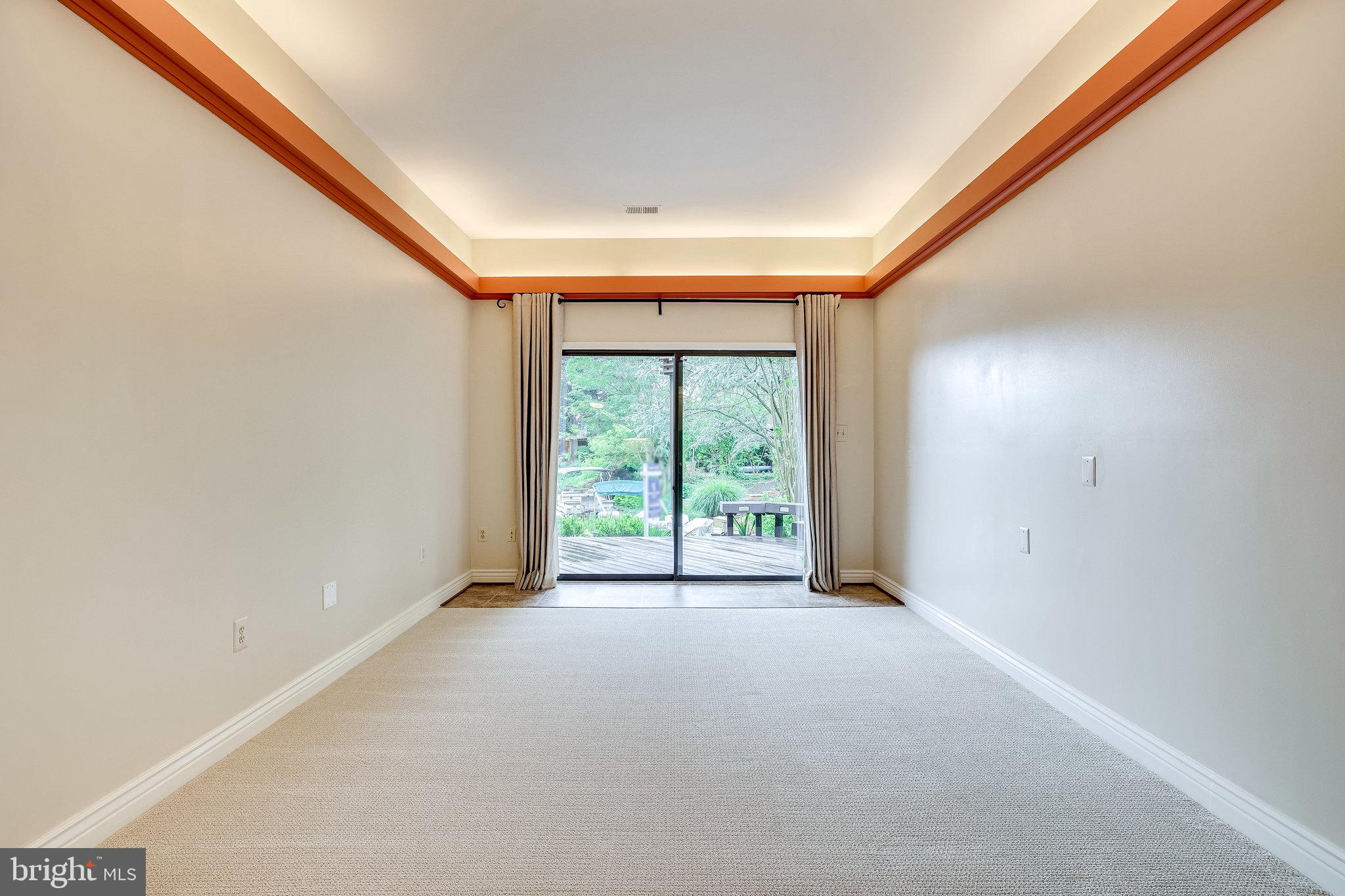 2024 Lakebreeze Way Reston, VA 20191 - Photo 64 of 95 The recreation room has new, neutral carpet (2022)