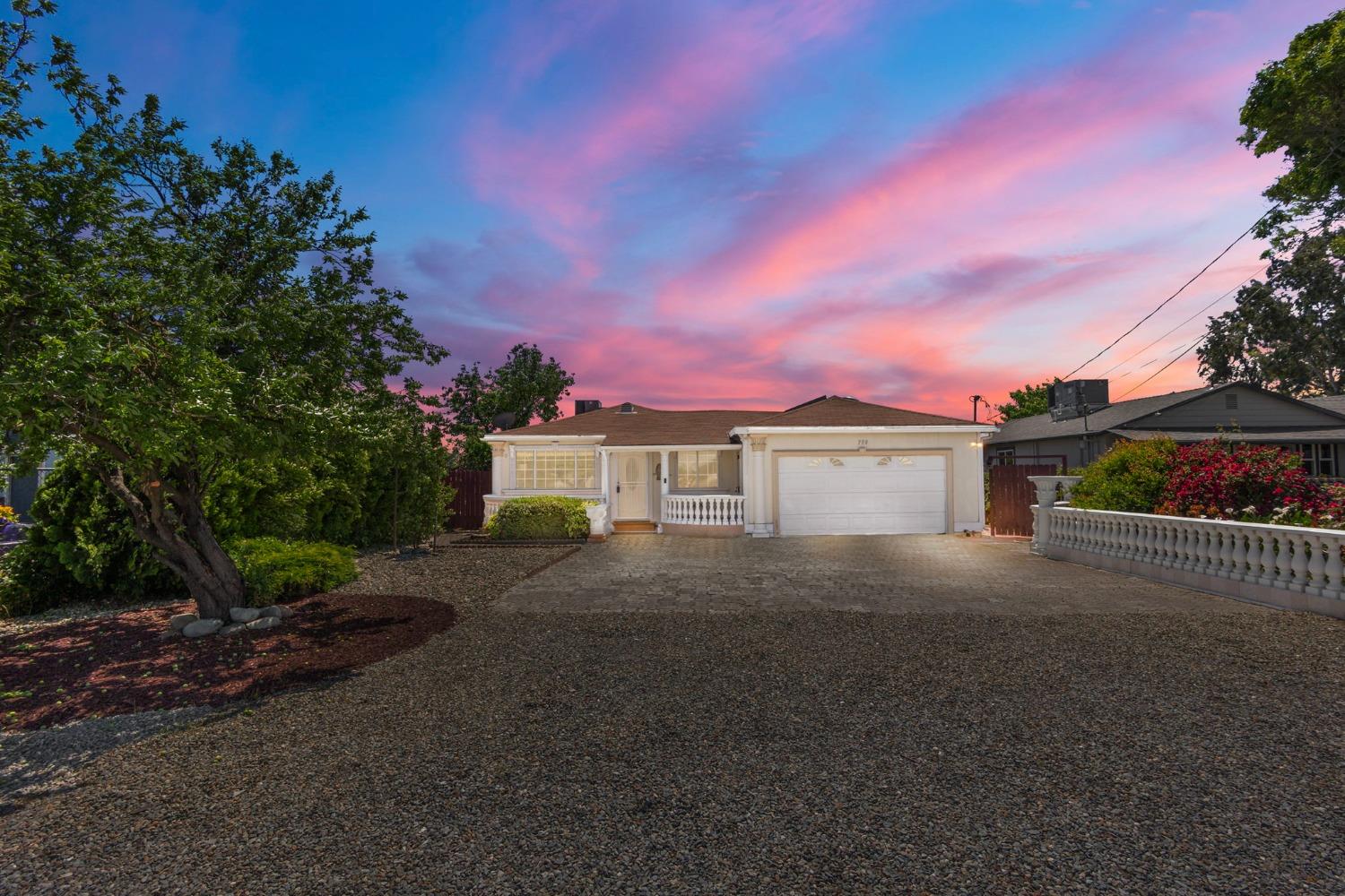 738 Elverta Road Elverta, CA 95626 - Photo 1 of 1 a view of a house with a yard and a street