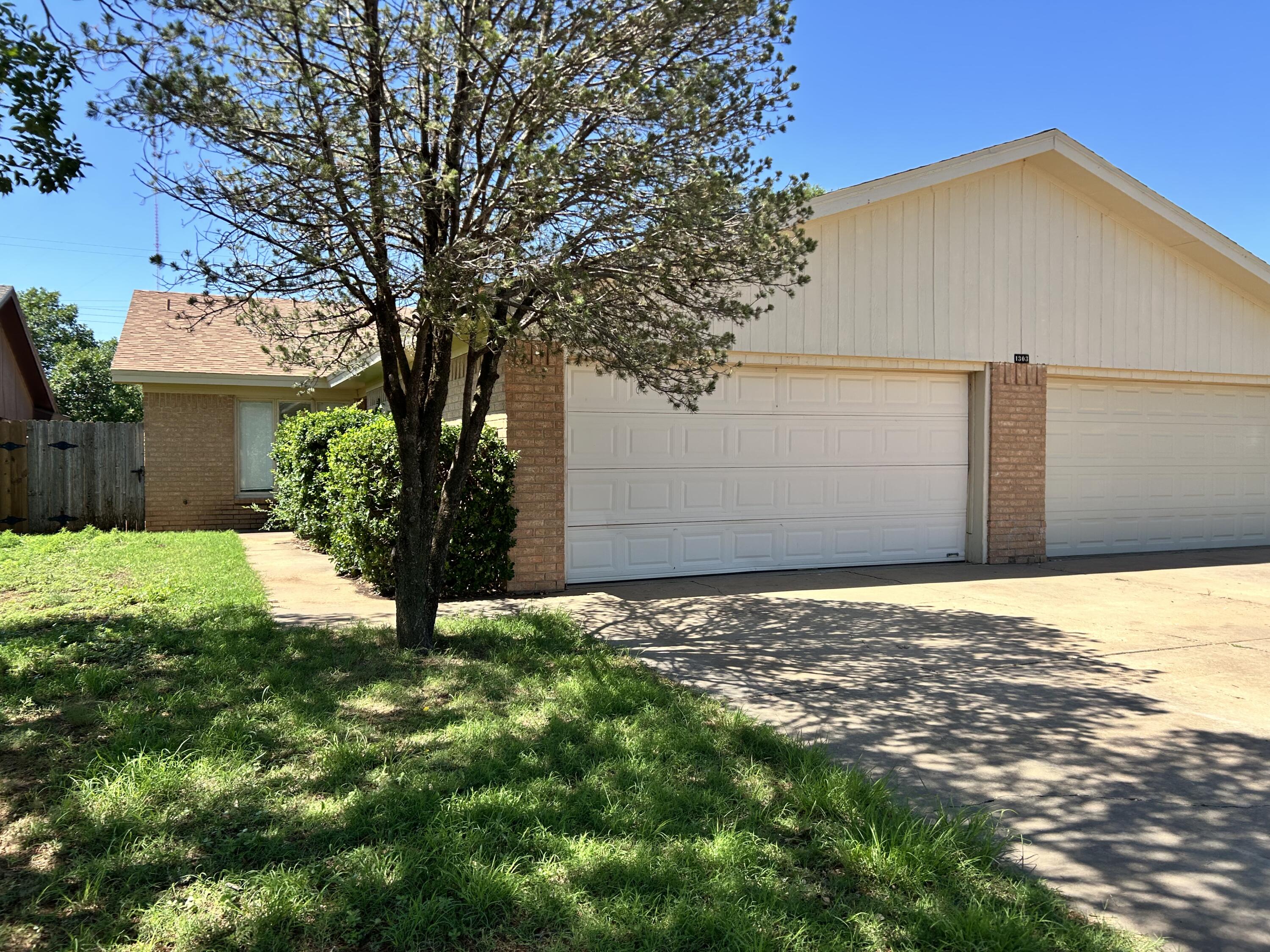 1303 80th Street, Unit A Lubbock, TX 79423 - Photo 1 of 16 IMG_0214
