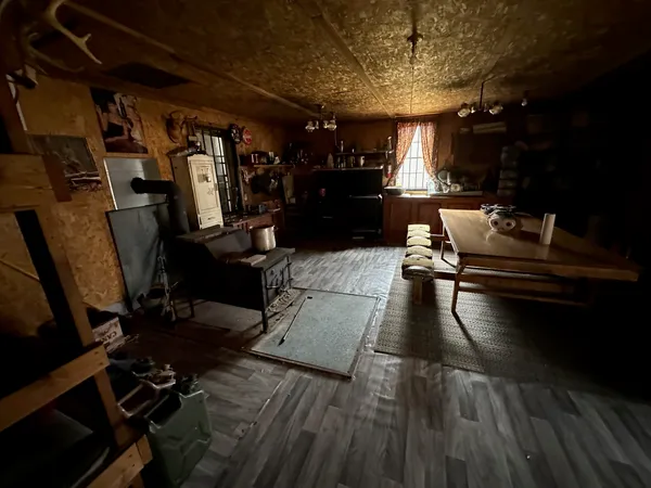 a living room with hard wood floor