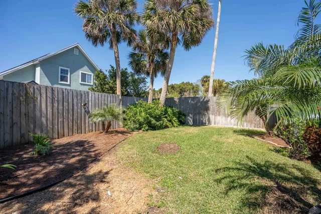 a view of a field with an ocean