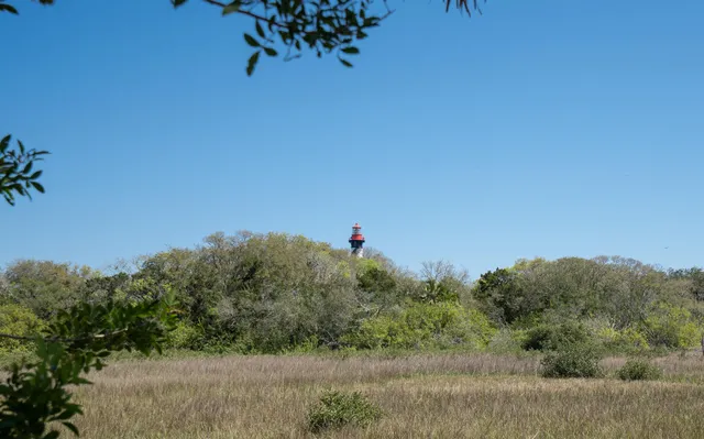 a living room with large windows