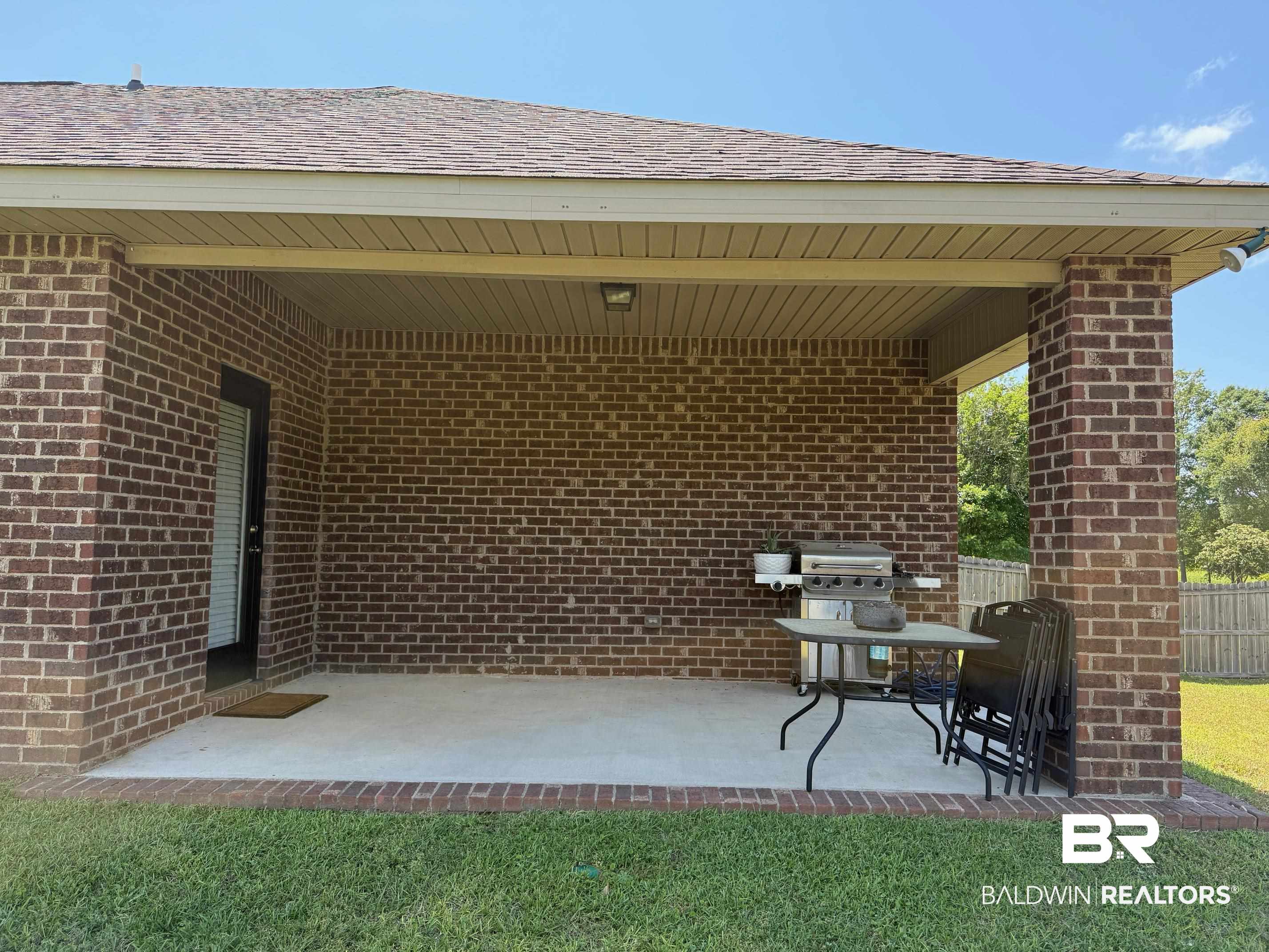 2996 Notsram Court Mobile, AL 36695 - Photo 3 of 16 View of patio with grilling area