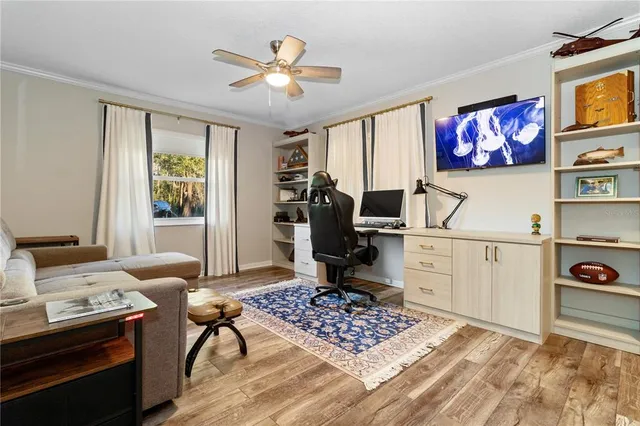 a living room with furniture and a window