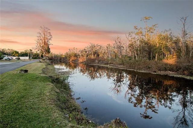 a view of a lake with a mountain in the background