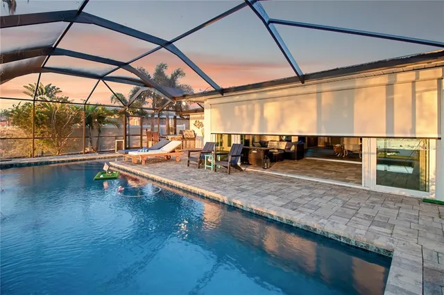 a view of a swimming pool with a couch