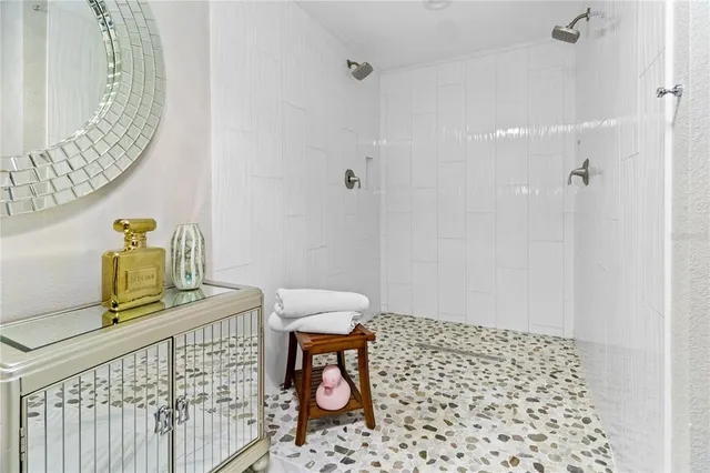 a bedroom with a bed and a table