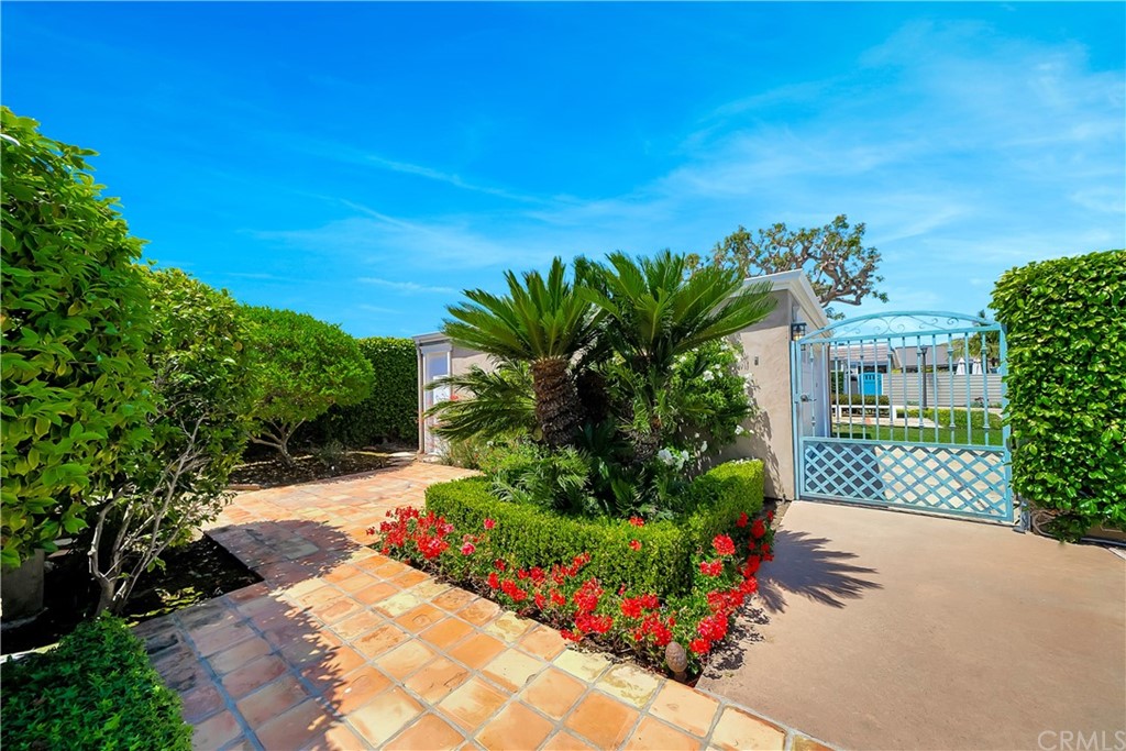 23802 Cassandra Bay Dana Point, CA 92629 - Photo 12 of 48 a front view of a house with a yard