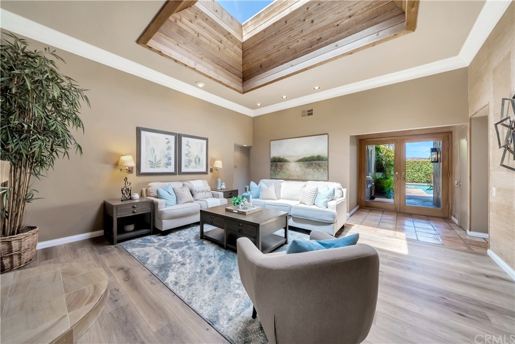 23802 Cassandra Bay Dana Point, CA 92629 - Photo 18 of 48 a living room with furniture and a large window