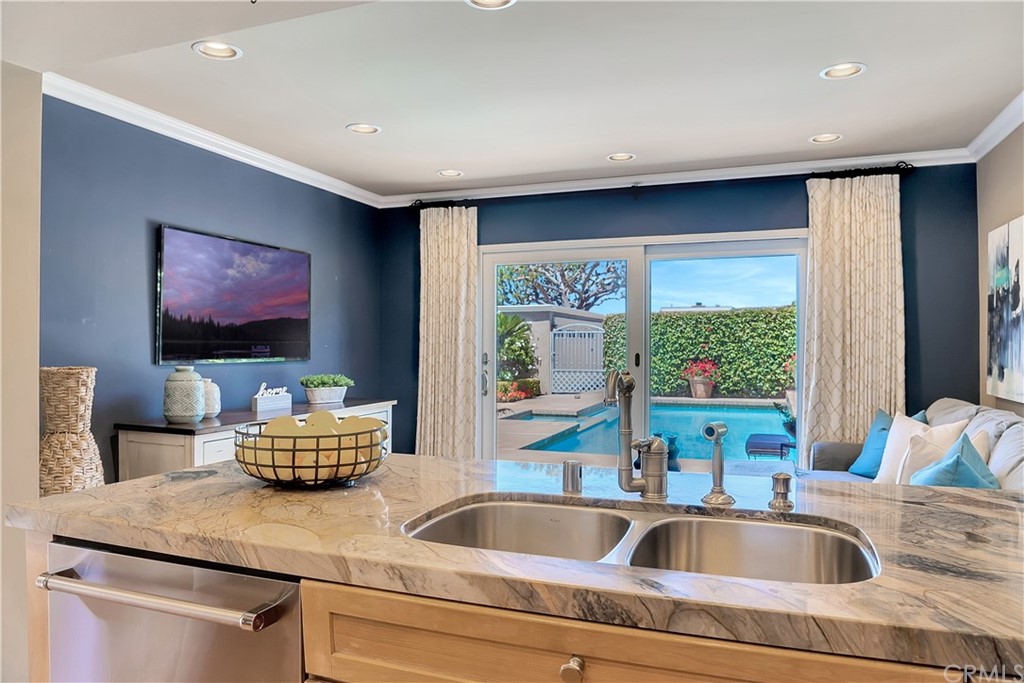 23802 Cassandra Bay Dana Point, CA 92629 - Photo 24 of 48 a kitchen with stainless steel appliances a sink and a granite counter tops