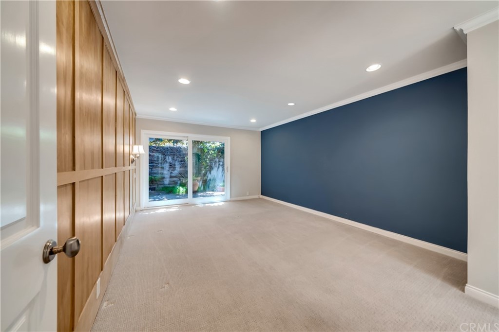 23802 Cassandra Bay Dana Point, CA 92629 - Photo 31 of 48 an empty room with wooden floor and windows