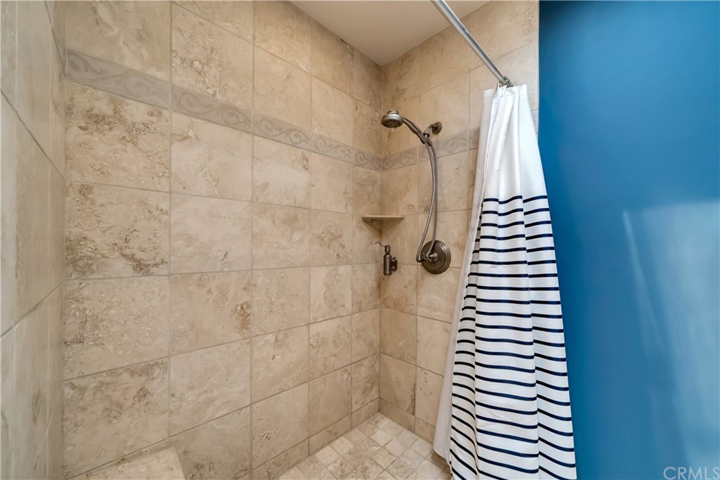 23802 Cassandra Bay Dana Point, CA 92629 - Photo 36 of 48 a bathroom with a shower