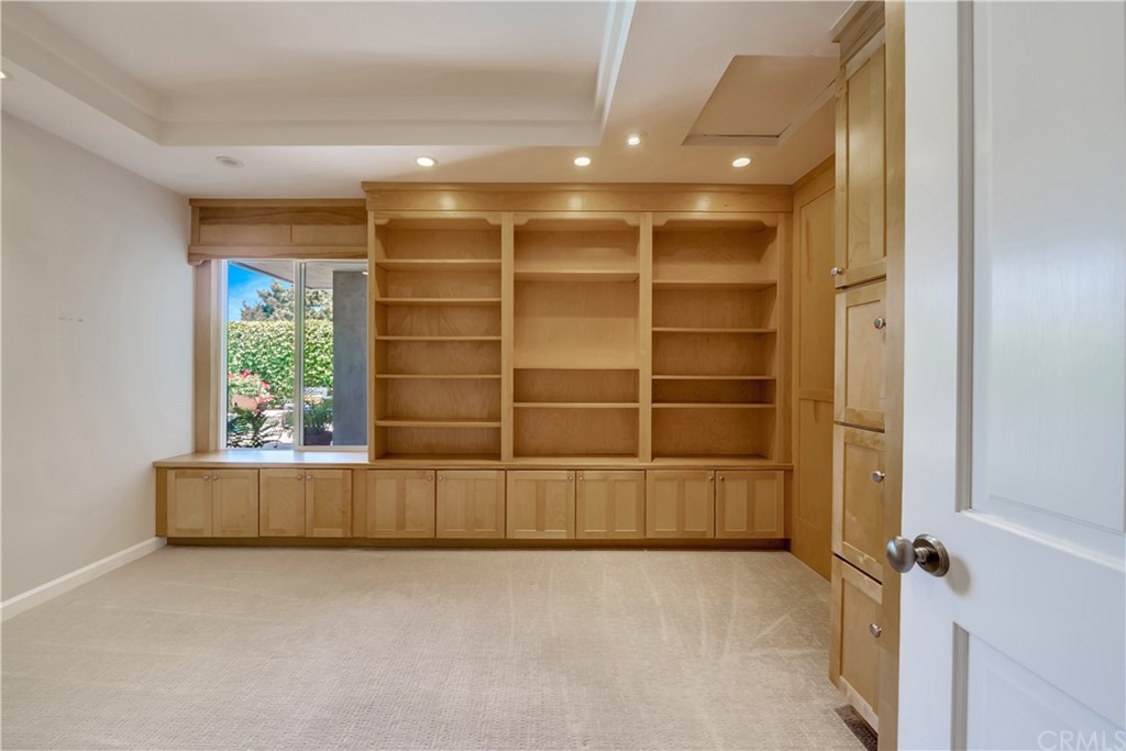 23802 Cassandra Bay Dana Point, CA 92629 - Photo 37 of 48 a view of an empty room with a window and cabinet